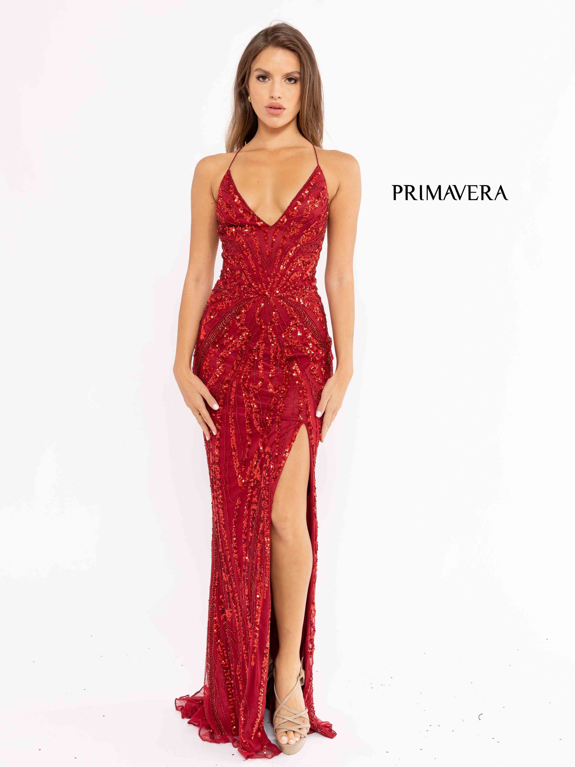 Primavera Couture 3958 Prom Dress Long beaded Gown. Its has a slit and a beautiful design on the gown.