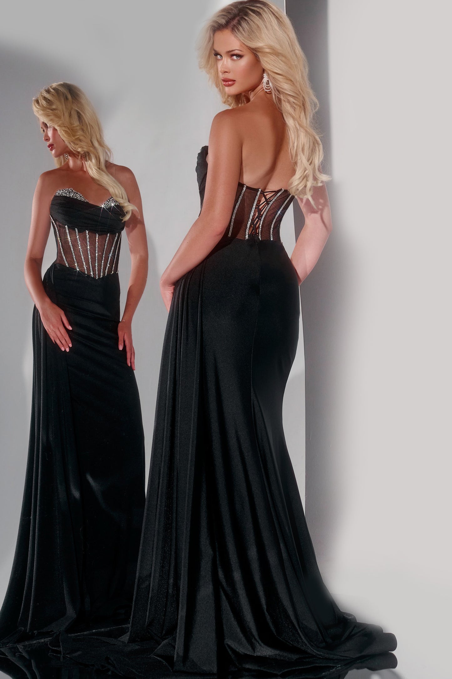 Unlock the epitome of glamour with our Jovani 42226 Sheer Crystal Corset Prom Dress. The crystal corset accentuates your curves while the maxi slit overskirt exudes elegance. Perfect for formal evening events, this gown will have you feeling like a work of art.