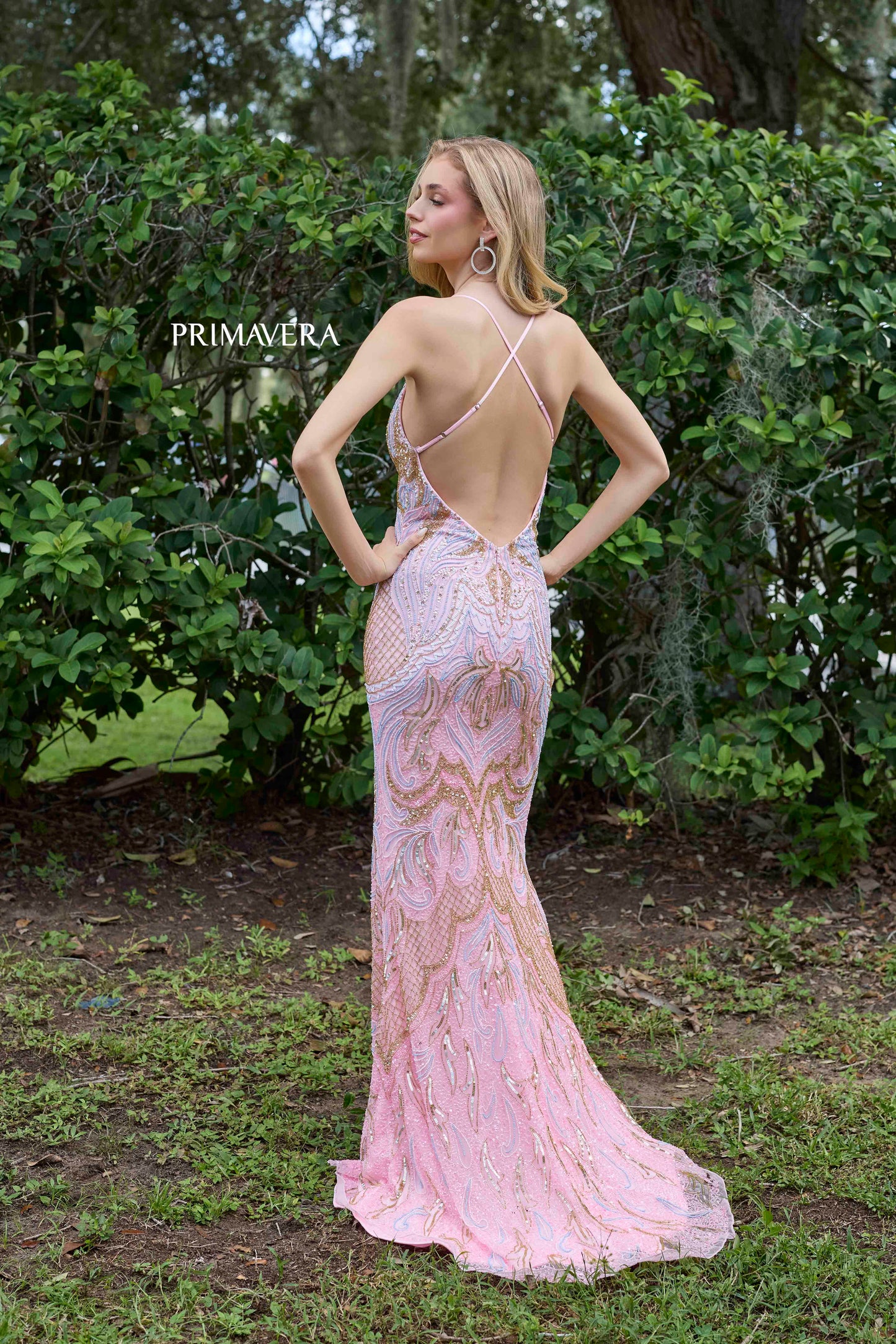 Experience elegance and sophistication in the Primavera Couture 4311 Long Beaded Backless Prom Dress. With a stunning V-neck and intricate beading, this formal evening gown is perfect for any special occasion. The backless design adds a touch of allure, making you stand out from the crowd.