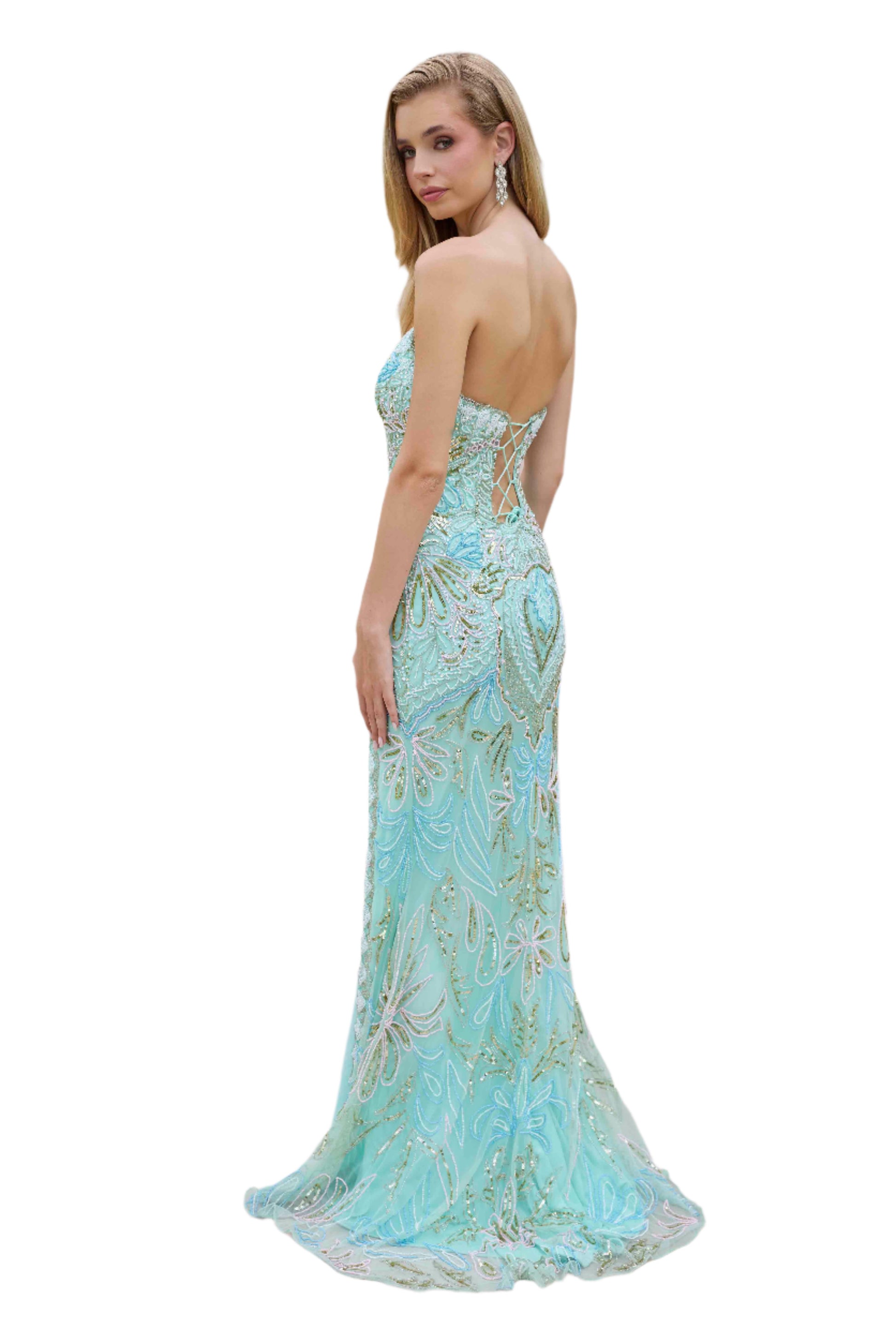 This Primavera Couture 4382 dress exudes elegance with its long beaded strapless corset, slit V-neck design, and formal evening gown style. Perfect for prom or any special occasion, it offers a flattering silhouette and stunning details. Elevate your look with this exquisite dress.