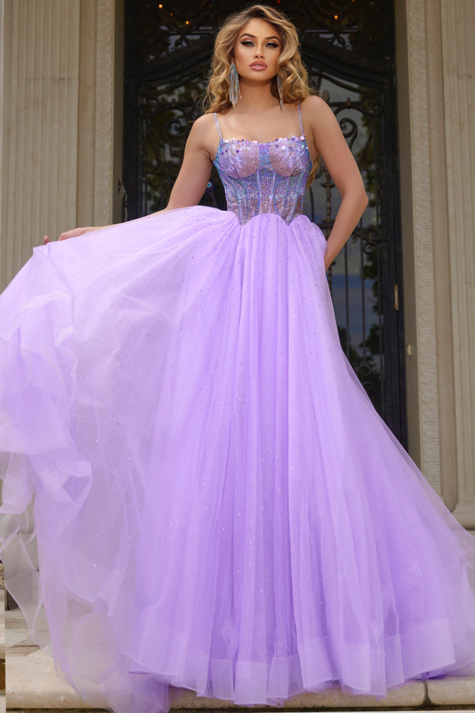 Indulge in luxury with the Jovani 44511 prom dress. Dazzling crystal bodice, A-line silhouette and shimmering sequins create a glamorous look. The scoop neck adds an elegant touch while the tulle and formal design elevate the style. Perfect for prom or pageants. Step into elegance with this exquisite ball gown, featuring a fitted beaded corset bodice that shimmers with intricate details. 