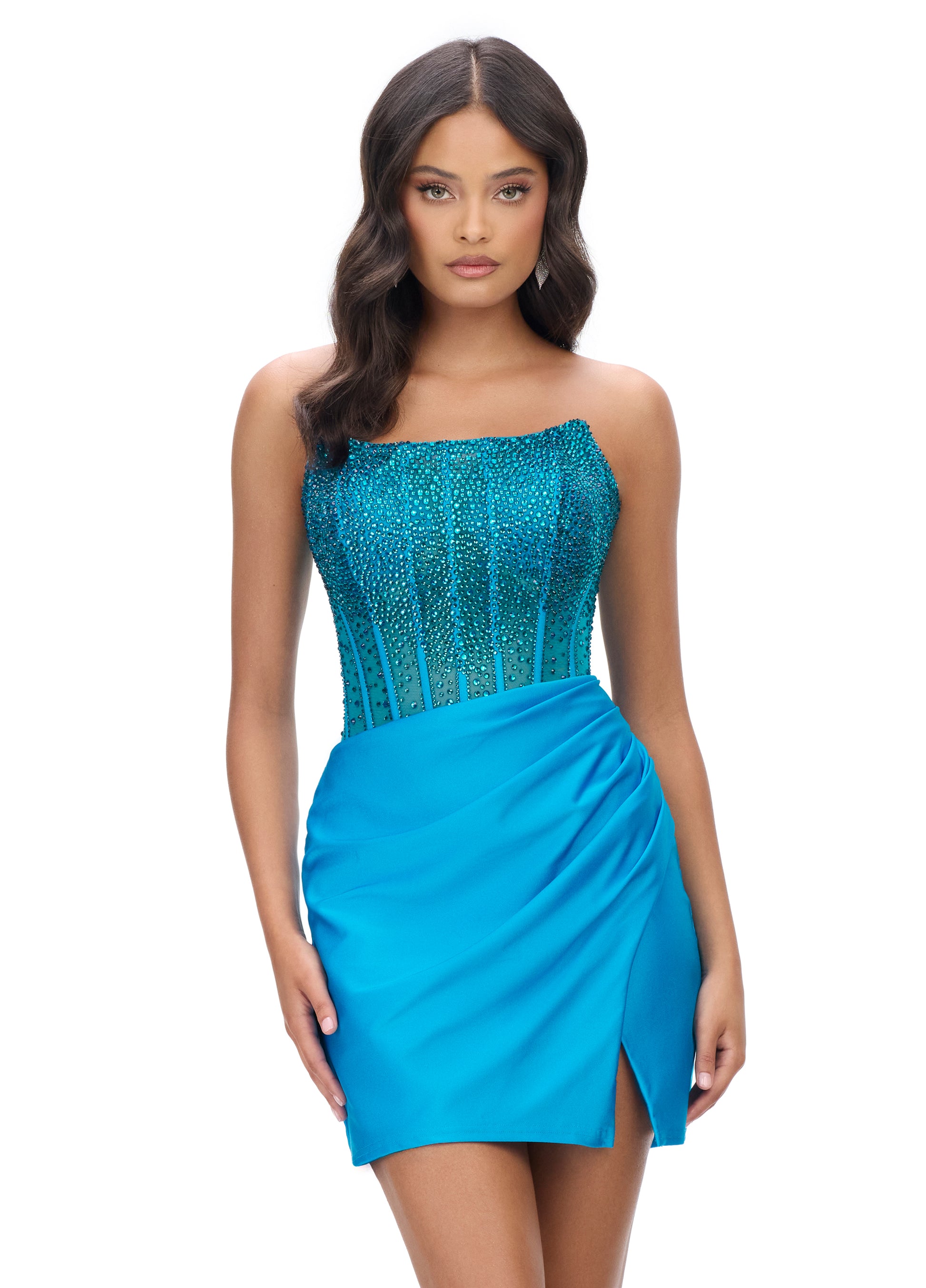 Achieve a stunning look with the Ashley Lauren 4686 Short Sheer Crystal Homecoming Dress. This formal gown features a corset boning for a flawless fit. The scoop neck design adds a touch of elegance, while the sheer crystal detailing adds a subtle sparkle. Perfect for any special occasion.