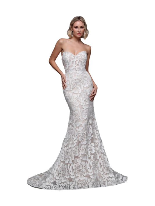 Indulge in elegance with the Davinci 50870 Embroidered Lace Wedding Dress. This strapless mermaid gown is adorned with delicate lace and shimmering beadwork along the bust and detachable spaghetti straps, exuding luxury and sophistication. The perfect choice for a glamorous and timeless bridal look. Experience true beauty on your special day.