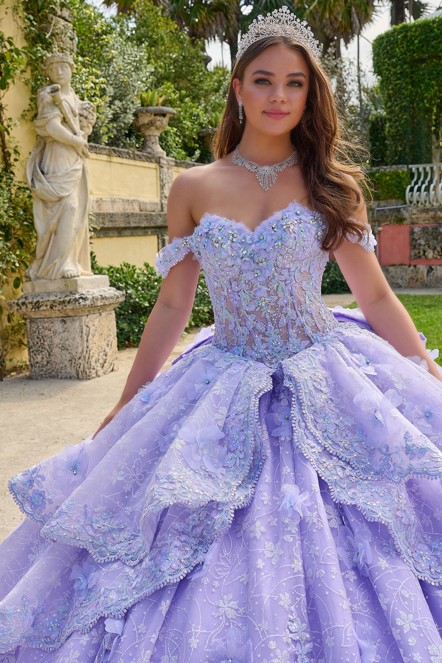 Get ready to shine in this enchanting quinceañera gown! The sweetheart neckline radiates elegance, while off-the-shoulder sleeves bring a playful charm. With its fitted bodice and full-length ball gown silhouette, you'll captivate everyone's gaze. But what truly sets this gown apart are its special touches. Delicate lace 