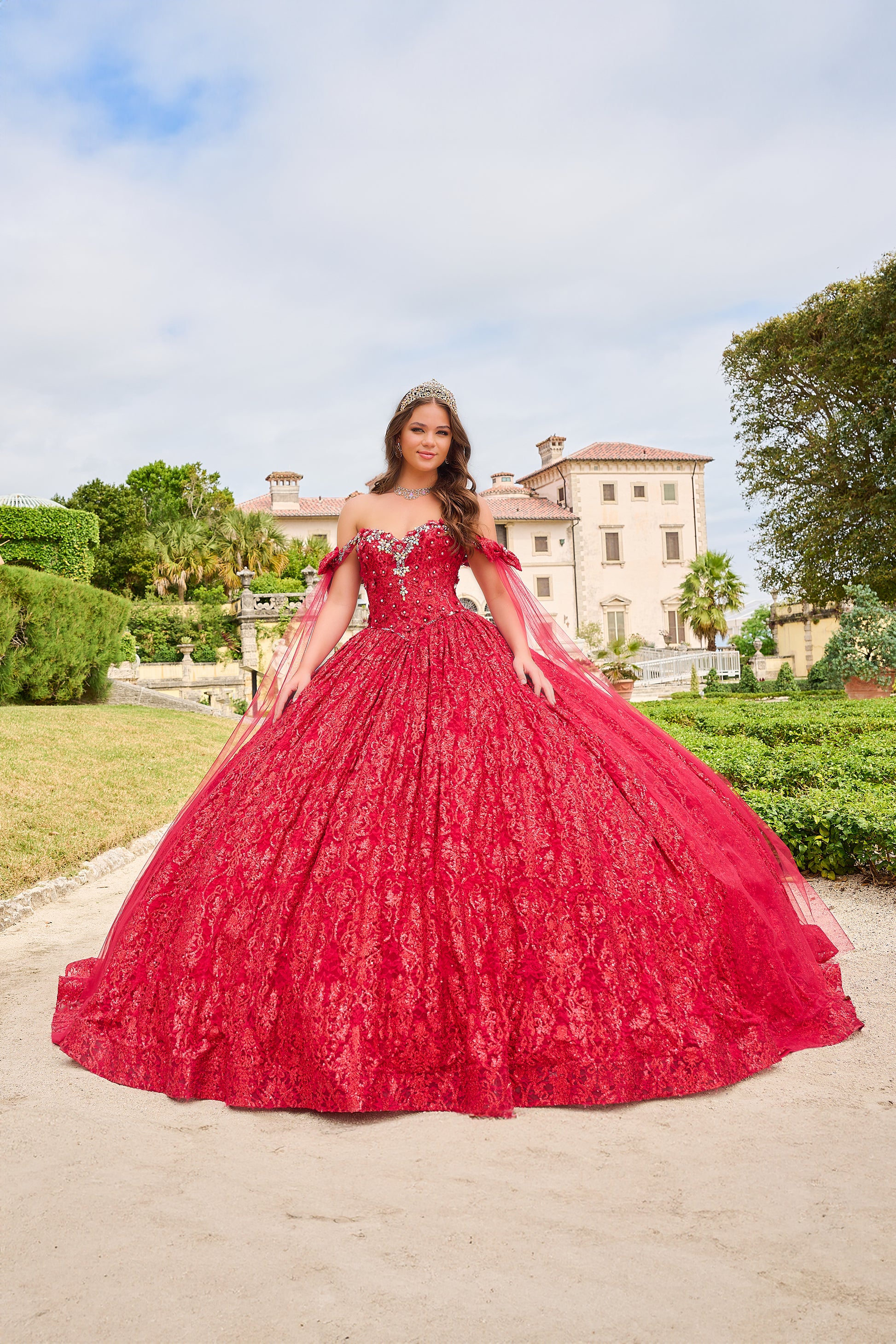 Amarra 54212 Step into enchantment with our beautiful quinceanera gown! Made of luxurious glitter tulle fabric with intricate lace and embroidered patterns, this dress boasts a strapless sweetheart neckline, short sleeves, detachable off-the-shoulder straps, and a cinched waistline for a dreamy silhouette.