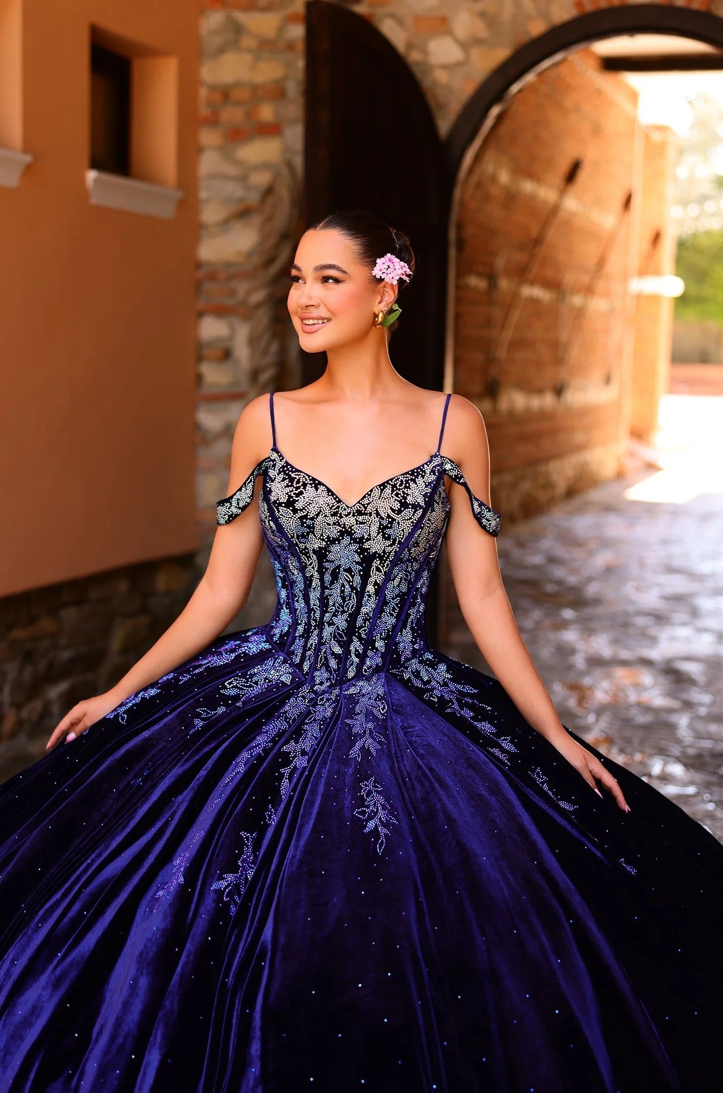 This elegant Amarra 54316 Velvet quinceanera dress is designed with a crystal corset, off-the-shoulder neckline, and princess ball gown silhouette. Made with soft velvet fabric, this dress will make any quinceanera celebration unforgettable. Perfect for a formal party or special occasion, this dress exudes sophistication and grace.