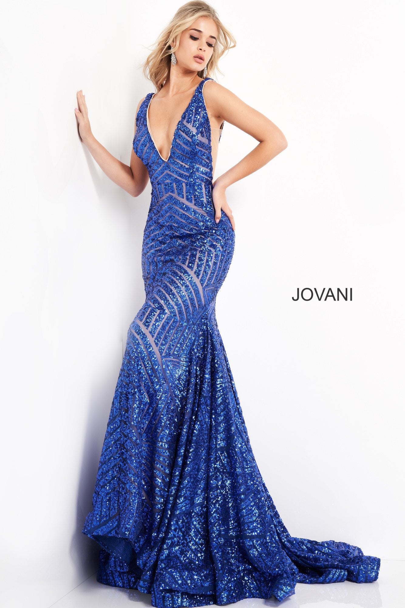 Long Jovani 59762 Prom Dress, Featuring a plunging neckline & A Fully sequined Fitted Mermaid Bodice. This Open V Back Pageant Gown & prom dress is perfect for the stage is has a lush trumpet sequin embellished skirt and sweeping train. 