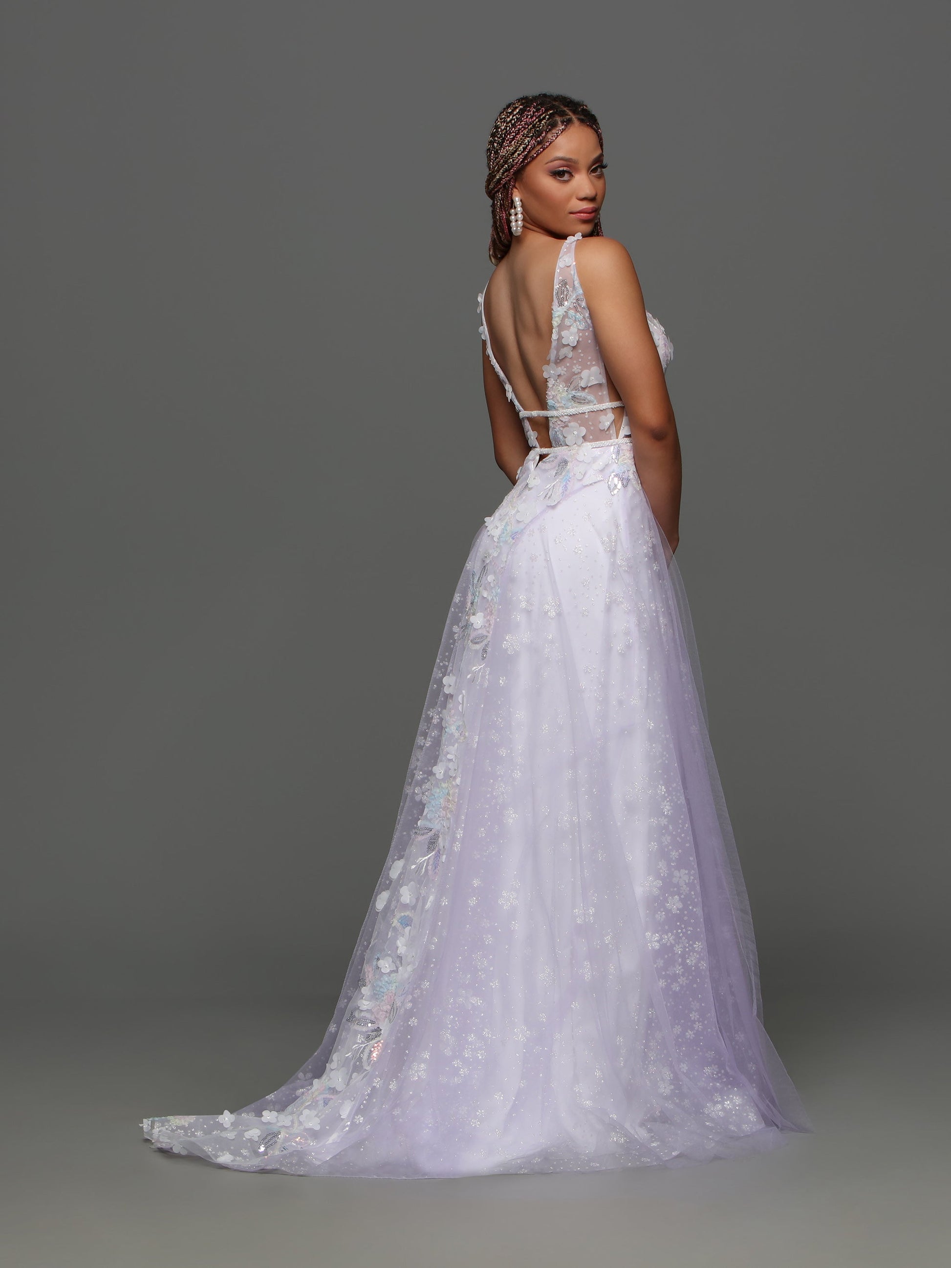 Get ready to turn heads in the Candice Wang 72308 Sheer Shimmer A Line Maxi Slit Prom Dress. The floral pastel design and sheer fabric create a breathtaking effect, while the A-line silhouette and high leg slit offer a flattering fit. Perfect for any formal occasion, this gown will make you feel confident and elegant.