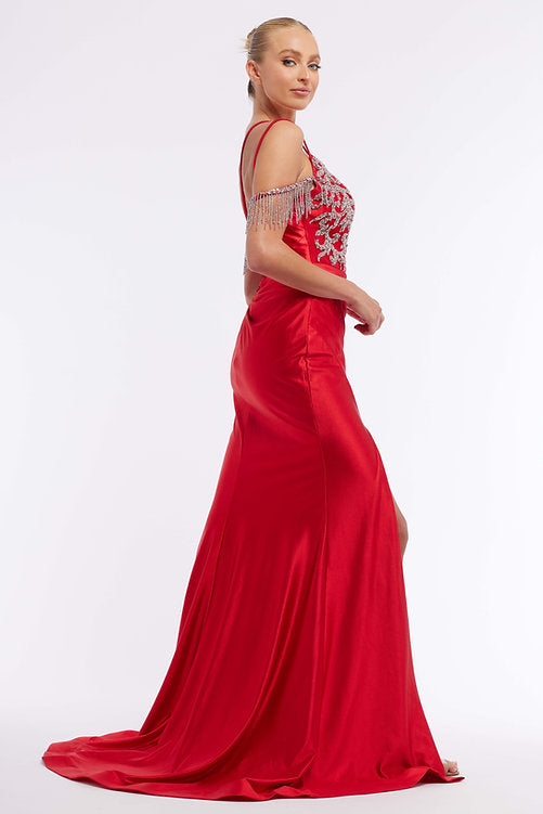 This Vienna Prom 7977 dress is perfect for special occasions. Crafted from satin, it features a ruched bodice and off-shoulder straps combined with a crystal fringe trim, a thigh-high slit. Make a lasting impression at your next event with this beautiful dress. Maxi slit Pageant Gown  Sizes: 00-16  Colors: Coral, Blue, Red