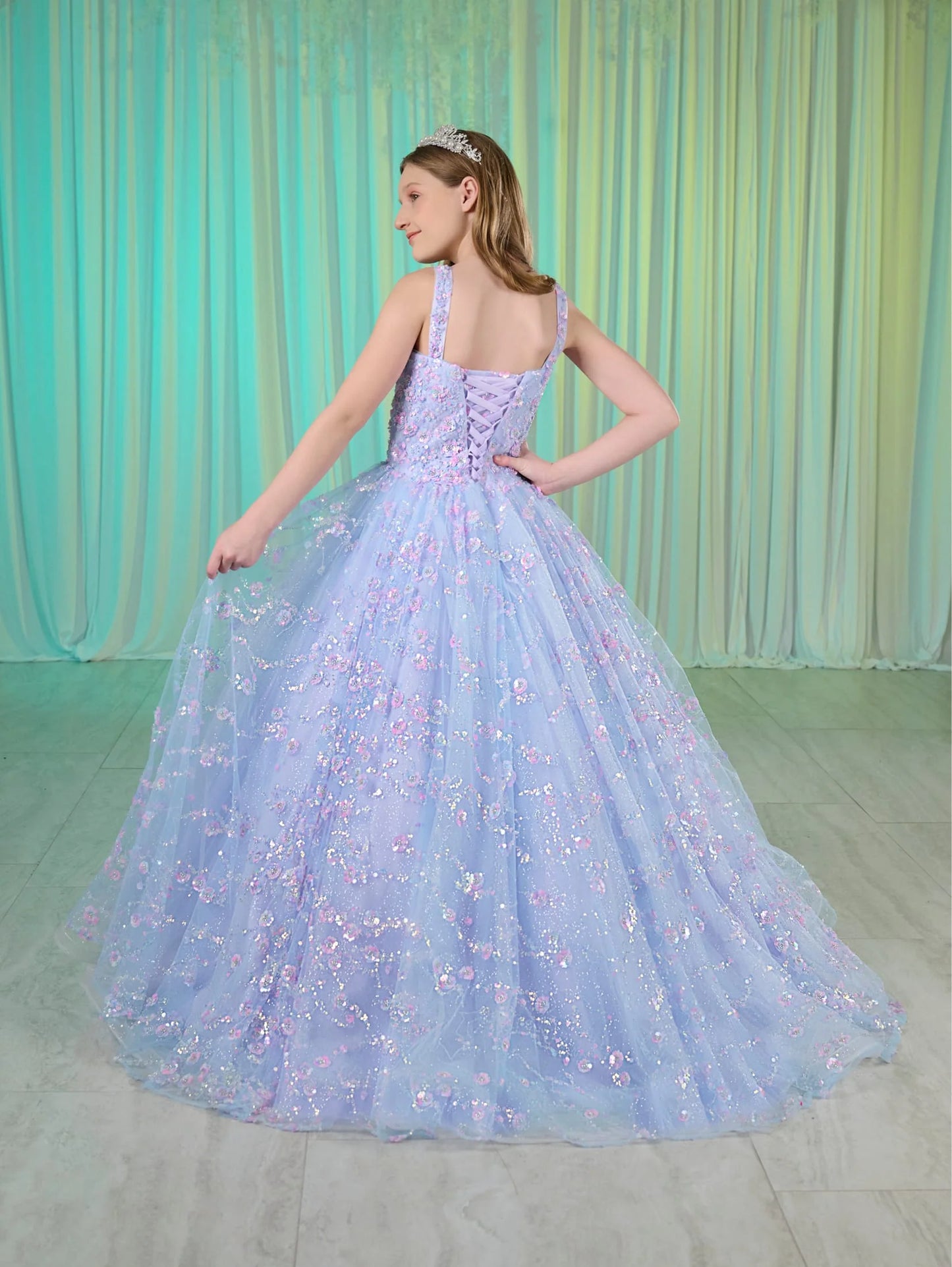 Rule the pageant with this dazzling Tiffany Princess 80026MQ sequin ball gown. With a corset style bodice and scoop neck, this dress will make you shine. The train adds an extra touch of elegance. Be the talk of the town in this show-stopping pageant dress.