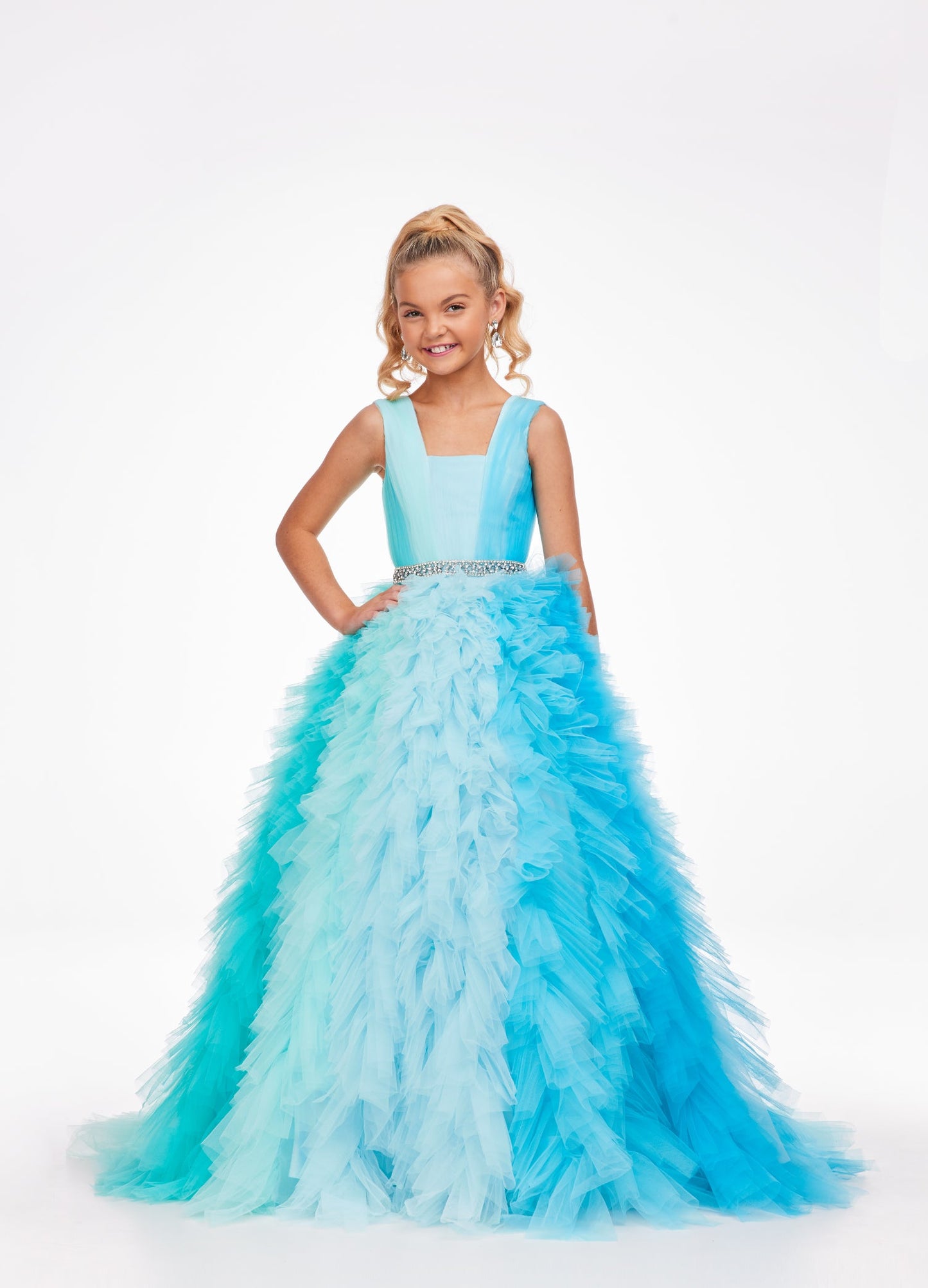 Ashley Lauren Kids 8137 Girls and Preteens Pageant Dress.  This stand out kids gown features a square neckline giving way to a crystal encrusted belt. The ombre tulle skirt completes the look.  Available colors:  Pink Multi, Blue Multi  Available sizes:  4, 6, 8, 10, 12, 14, 16