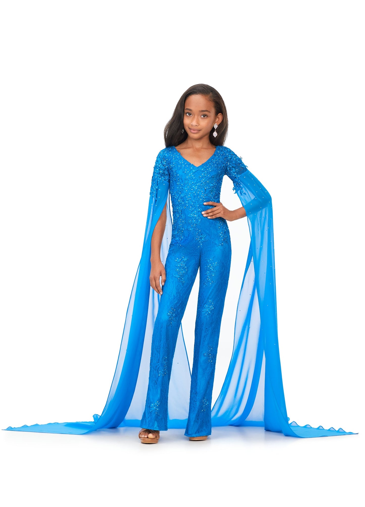 Ashley Lauren Kids 8162 Lace Girls Cape Sleeve Jumpsuit Formal Fun Fashion V Neck Chiffon This jumpsuit is bringing all the drama. It features a v-neckline, lace embroidery and dramatic cape sleeves perfect for your next fun fashion or runway. V-Neckline Embroidery Cape Sleeves Jumpsuit