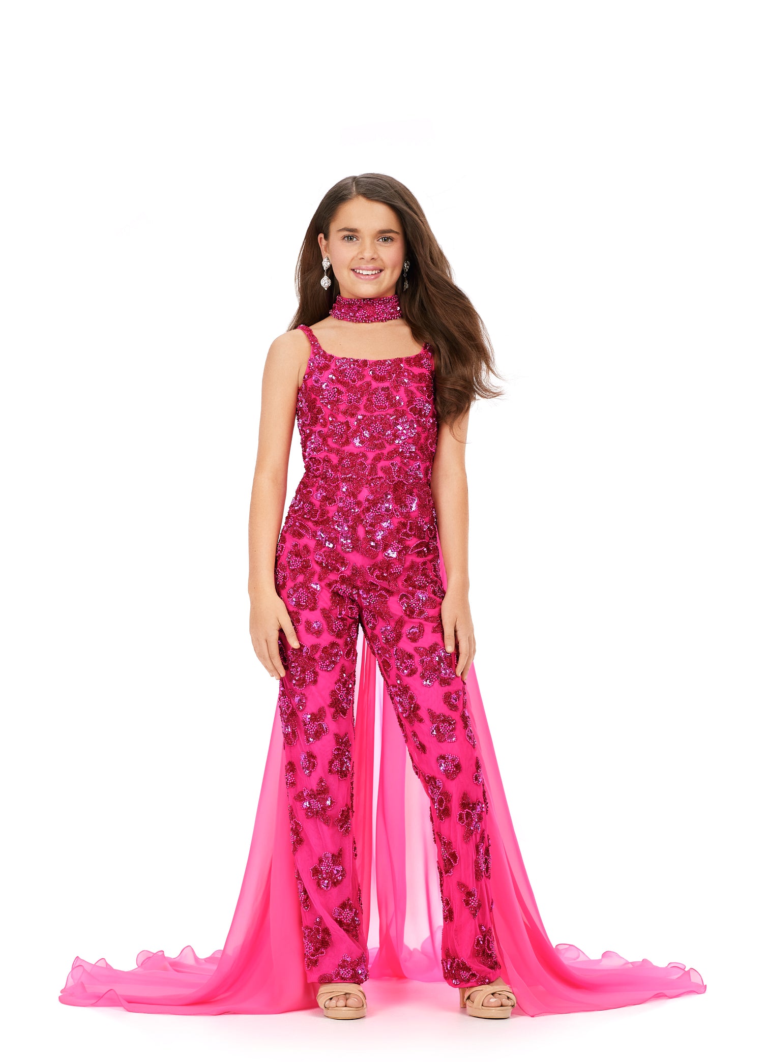 Ashley Lauren Kids 8190 Fully Beaded With Beaded Choker And Chiffon Cape Jumpsuit. A jumpsuit for a queen! This fully beaded number features a matching choker with an attached cape. This screams fabulous!