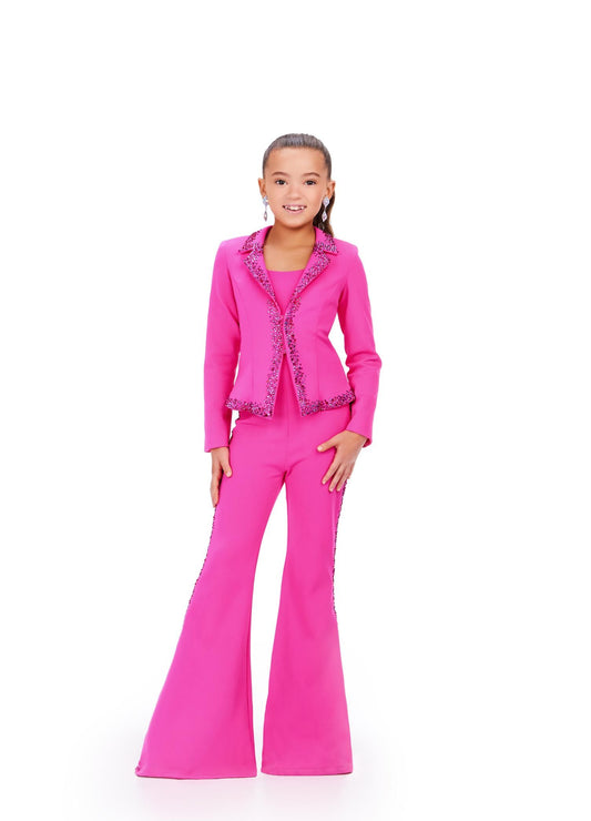 The Ashley Lauren Kids 8209 Two Piece Jumpsuit Suit features bell-bottom trousers and a crystal-studded jacket for a fashionable pageant look. High-quality materials ensure long-lasting comfort and style. Strike a pose in this fun and fabulous two piece set! Made from scuba, this suit has press on stones that trim the jacket and pant legs.  Two Piece Press On Stone Trim Flare Pant Legs Jumpsuit Sizes: 2-16 Colors: Black, Fuchsia, Royal Blue