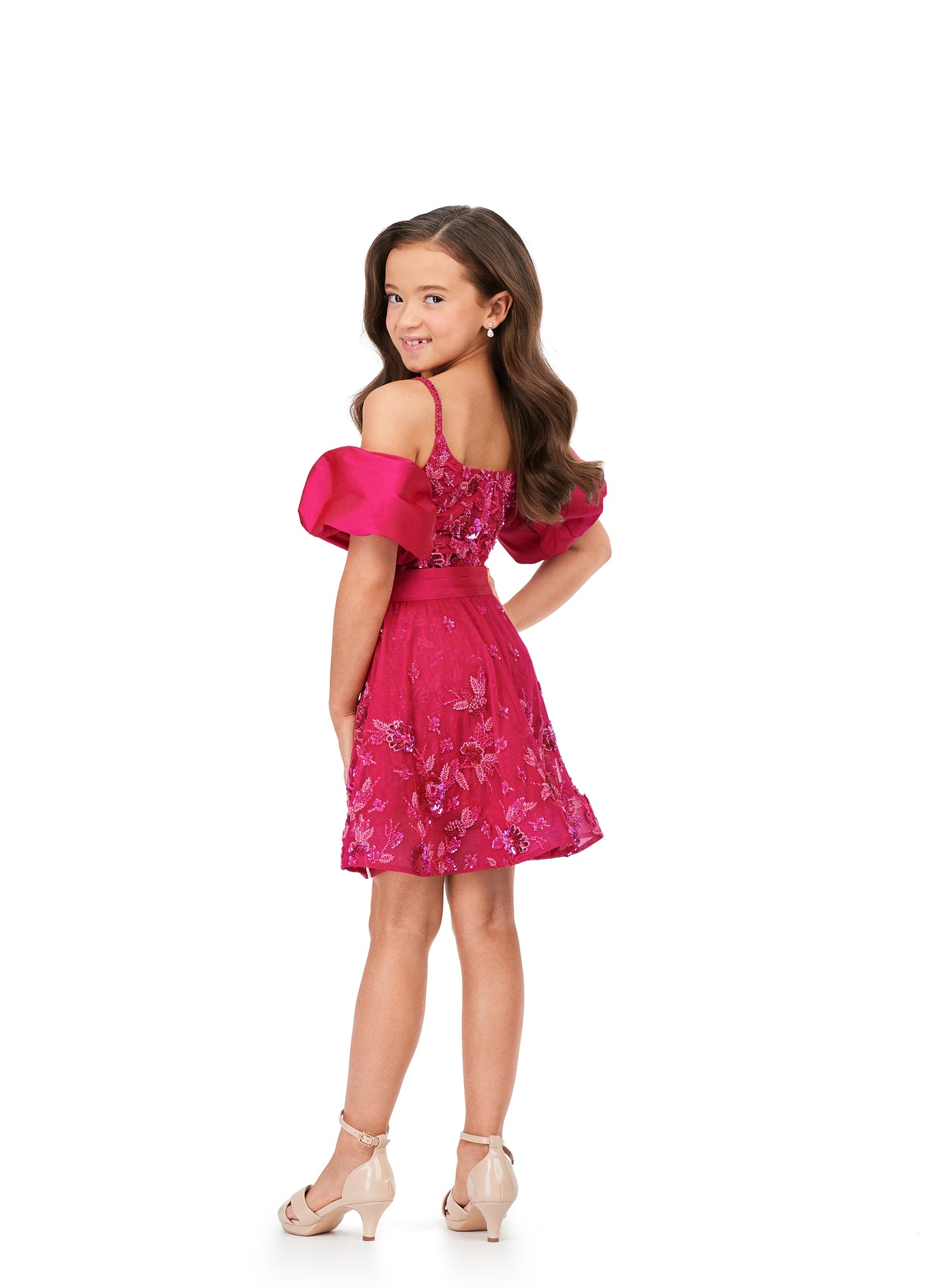 Ashley Lauren Kids 8233 Fully Beaded Spaghetti Straps With Detachable Puff Sleeves Detachable Overskirt Romper. Have the most fun in this beaded romper complete with detachable puff sleeves and an overskirt!