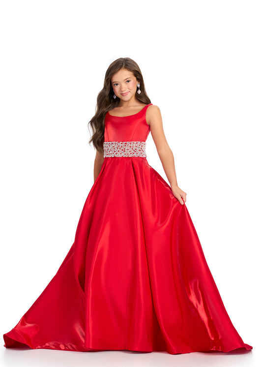 Indulge in luxury and sophistication with the Ashley Lauren 8276 Girls Satin Ballgown. This exquisite piece features a beautiful satin fabric that flows effortlessly, while the embellished crystal waistline adds a touch of glamour. Perfect for your little princess, this ballgown will make her feel like royalty.