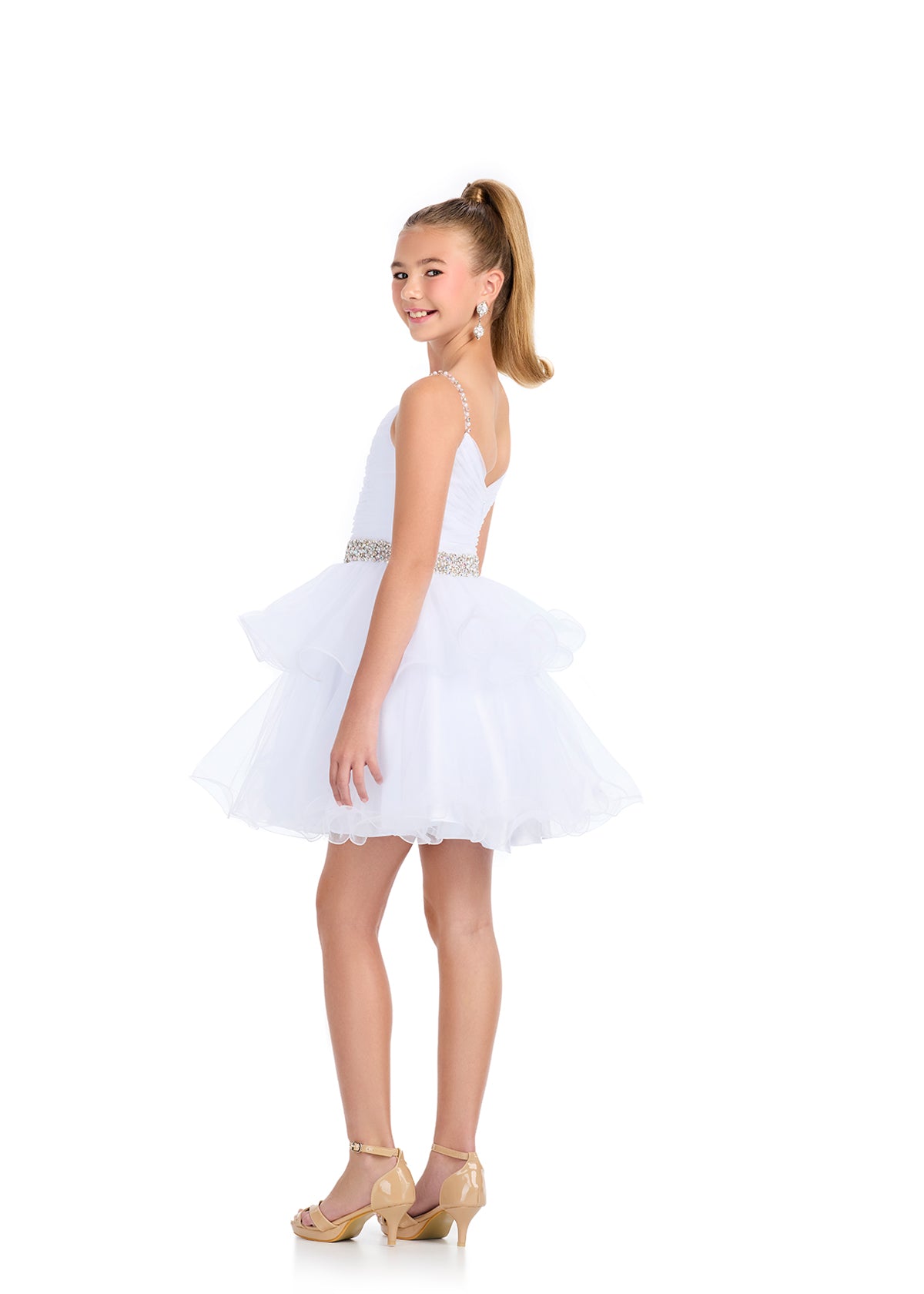 Elevate your little girl's special occasion style with the Ashley Lauren 8279 Girls Short Tulle Cocktail Dress. This stunning dress features delicate embellished spaghetti straps and waistline, adding a touch of glamour to the classic tulle design. Perfect for any formal event or celebration, this dress is a must-have for your child's wardrobe.

Colors:&nbsp; Red, Black, Neon Pink, White

Sizes:&nbsp; 2-16