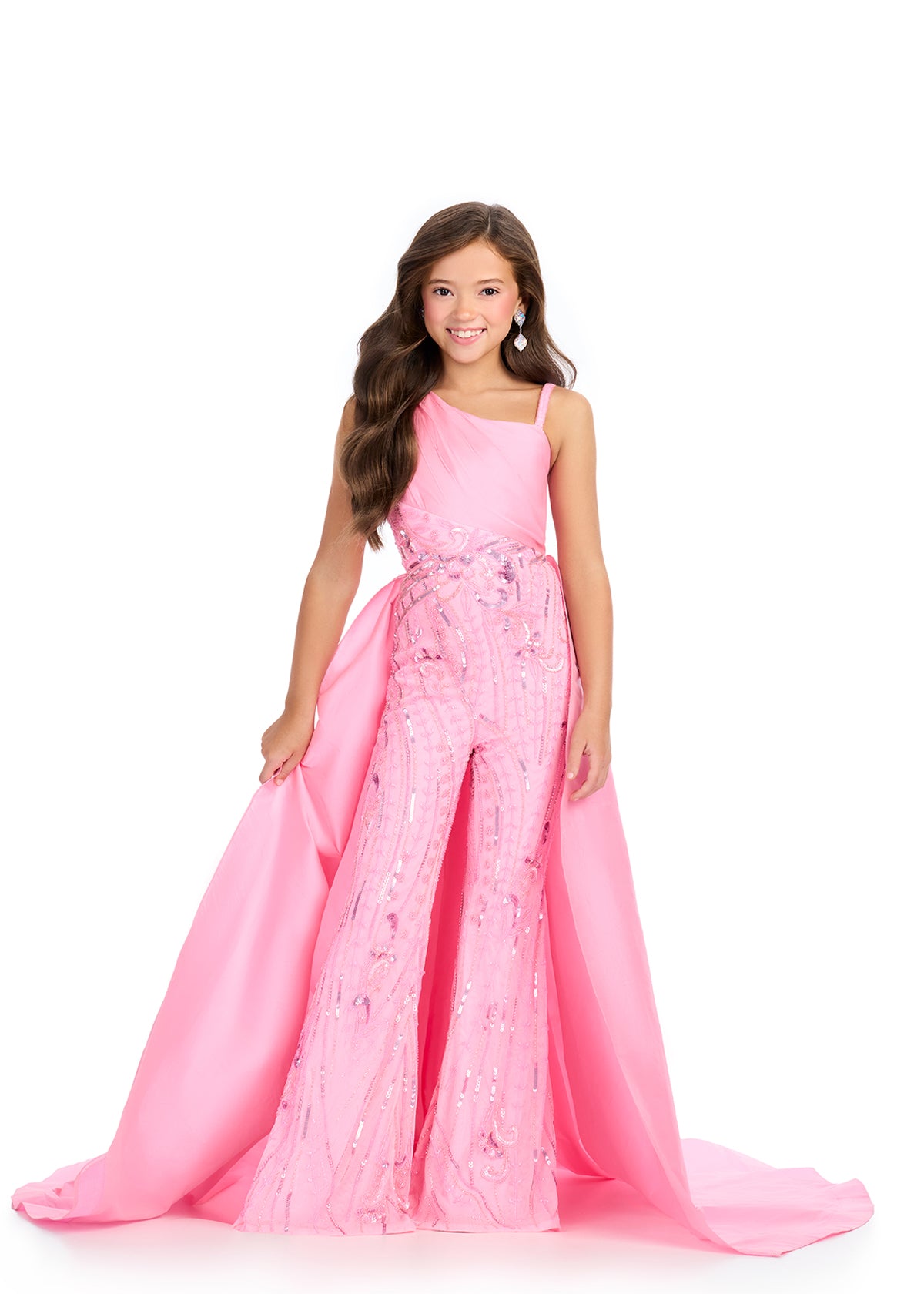 Elevate your little girl's style with the Ashley Lauren Kids 8287 Girls Pageant Jumpsuit. This fun and fashionable jumpsuit features intricate beading and a flowy overskirt for a glamorous look. Perfect for formal events, this jumpsuit will make your child feel confident and stylish. This taffeta jumpsuit is giving us all the glam! Featuring a one shoulder neckline and stunning beaded design, this look is complete with a sweeping train that takes our breath away!

One Shoulder
Fully Beaded Jumpsuit
Taffeta 