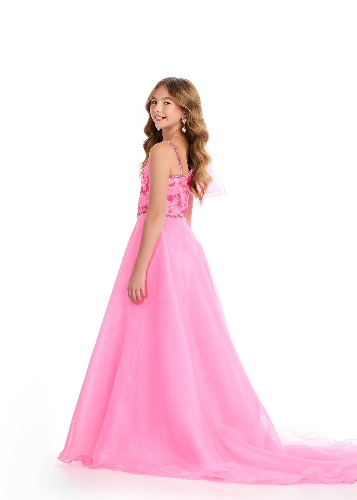 Designed for pageantry, the Ashley Lauren Kids 8300 Girls Beaded Pageant Dress features intricate beading and a one-shoulder design with a bow. The A-line ballgown silhouette adds a touch of sophistication for your little princess. Get ready to shine brighter than ever! This gorgeous ball gown features a fully beaded bustier, one shoulder neckline and adorable oversized bow. Complete with a fabulous organza skirt, this dress is sure to capture the spotlight!

One Shoulder
Beaded Bustier
A-Line
Organza Skirt