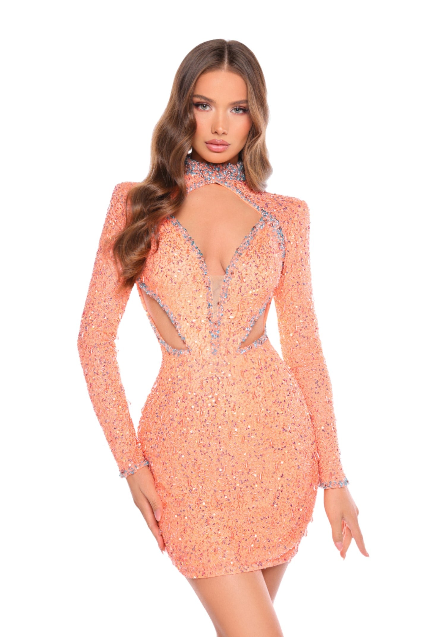 Expertly designed for a glamorous look, the Amarra 88020 short sequin cocktail dress features a long sleeve cutout and a stunning backless design. This formal gown is perfect for any special occasion, providing a confident and stylish look with its intricate sequin detailing. This dress can be described as an eye-catching, form-fitting cocktail dress made of sparkling, handed beaded with a plunging V-neckline. 