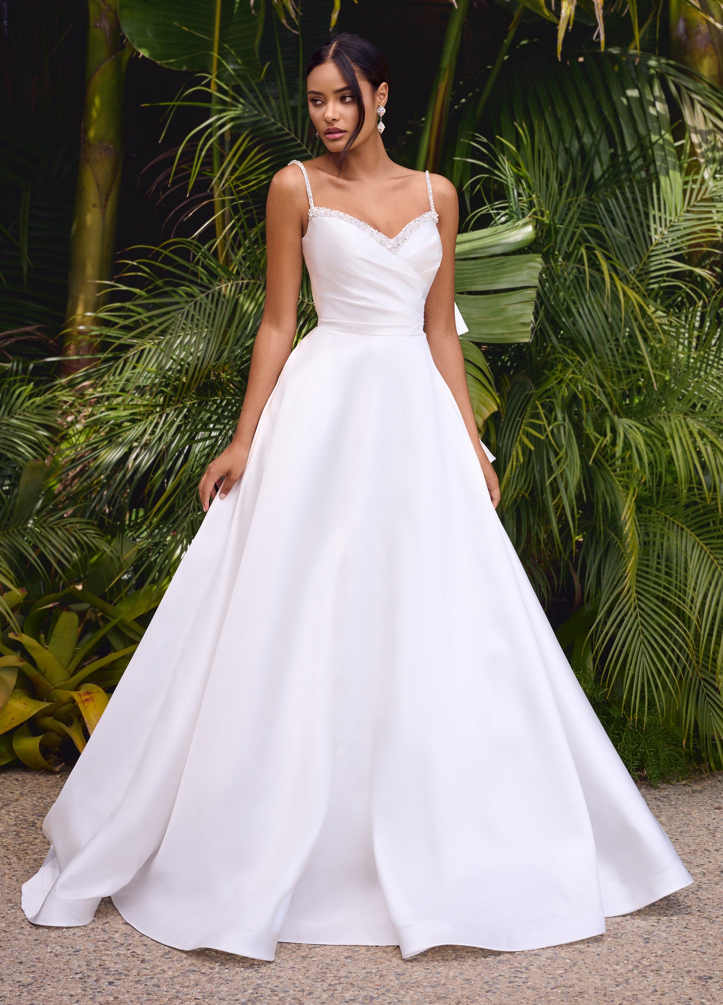 Elevate your evening look with the Ashley Lauren 11769 Satin Ballgown. This stunning and sophisticated gown features a sweetheart neckline, ruched bodice, and a full skirt with a train. The satin fabric adds a luxurious touch, while the bow detail adds a feminine and elegant touch. Perfect for any formal occasion.