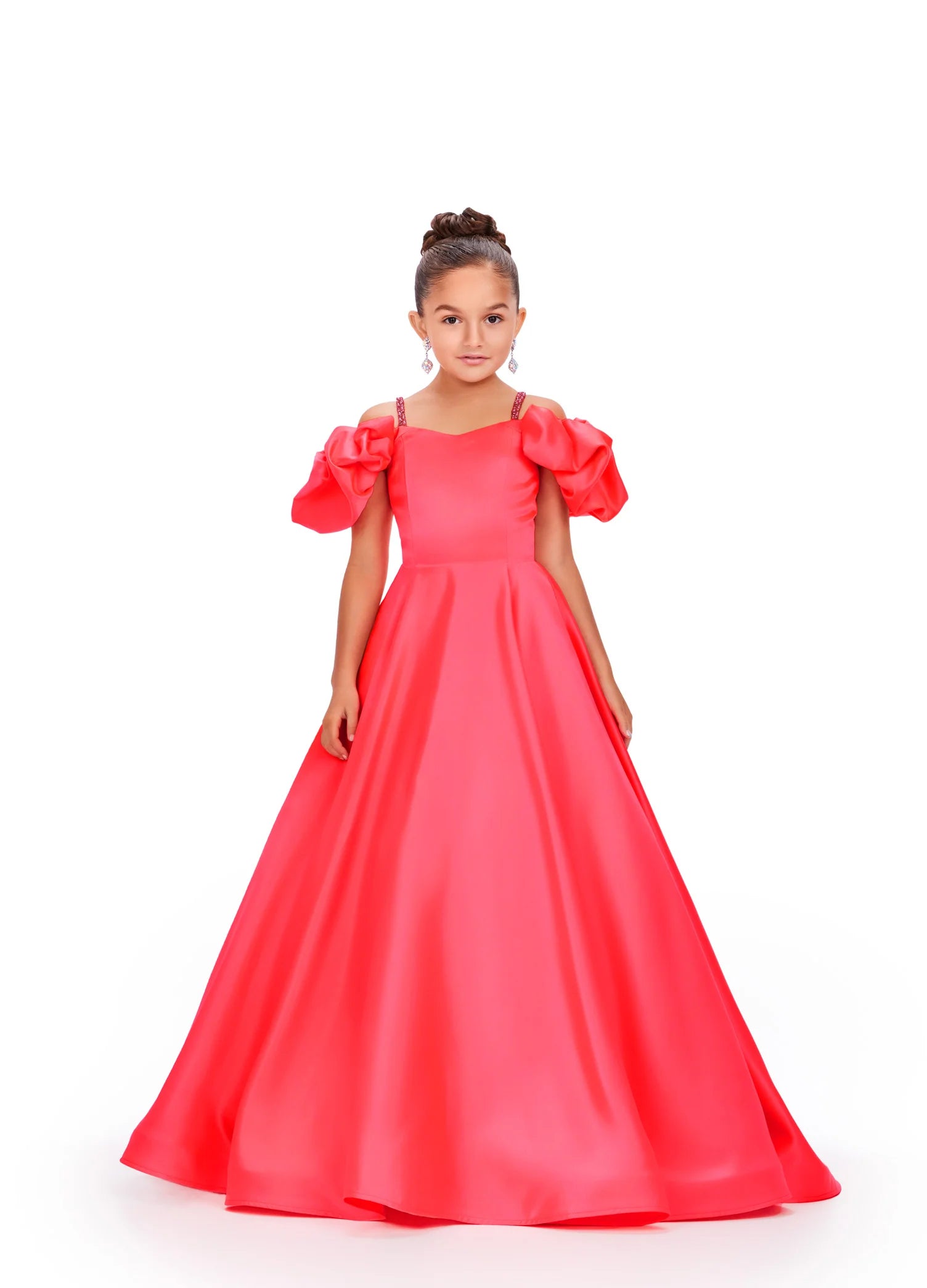 Elevate your little girl's pageant look with our Ashley Lauren Kids 8256 Girls Satin A Line Puff Sleeve Pageant Dress. This elegant ballgown features a stunning off the shoulder design and puff sleeves, adding a touch of sophistication to her appearance. Made with high-quality satin fabric, this dress will make her feel like a true princess. 