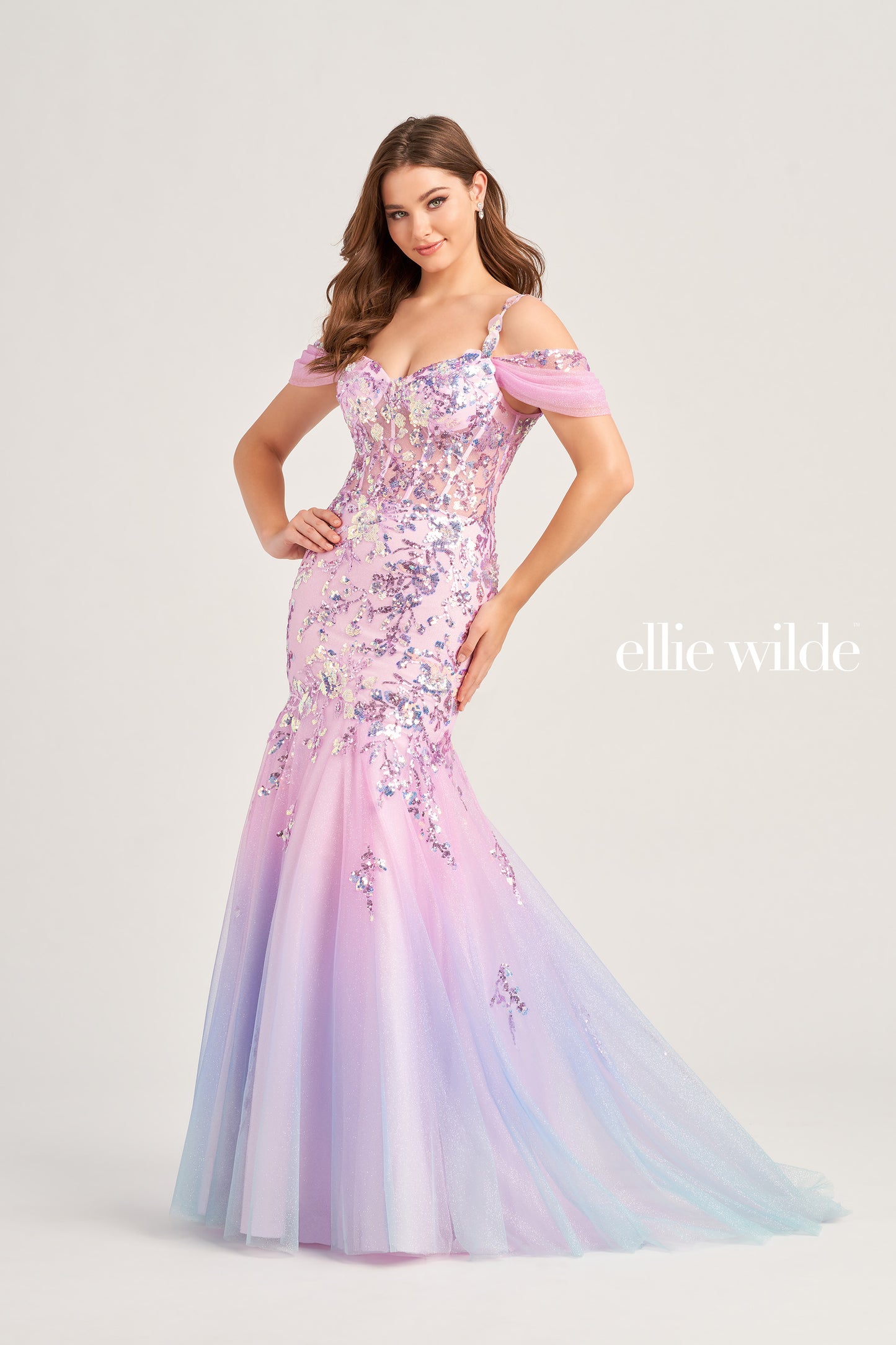 The Ellie Wilde EW35056 Ombre Sequin Sheer Corset Prom Dress will make a show-stopping entrance. It features a corset bodice, detachable off-shoulder glitter tulle straps, and a lace-up back for a custom fit. The mermaid silhouette and ombre sequin sheer fabric guarantee a glamorous look on your special night.  COLOR: COTTON CANDY, LIME SORBET, SEA BREEZE SIZE: 00 - 20