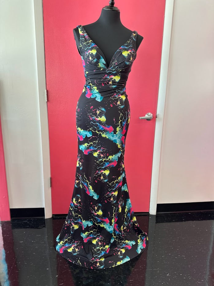 This Johnathan Kayne 9213 prom dress is a sophisticated showstopper. Crafted from neon jersey fabric and featuring a fitted silhouette, this floor-length gown makes a stunning statement. Its V neckline and Smoke Bomb coloring add to its modern look. Get ready to shine in this unforgettable style.  *ONE OF A KIND  Size: 4  Color: Black Smoke Bomb