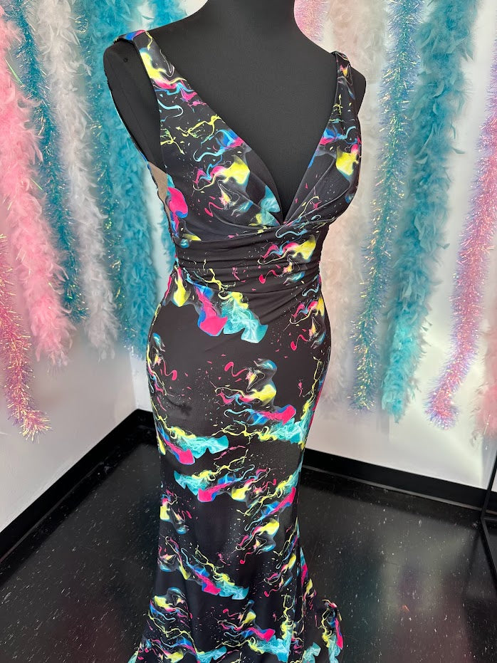 This Johnathan Kayne 9213 prom dress is a sophisticated showstopper. Crafted from neon jersey fabric and featuring a fitted silhouette, this floor-length gown makes a stunning statement. Its V neckline and Smoke Bomb coloring add to its modern look. Get ready to shine in this unforgettable style.  *ONE OF A KIND  Size: 4  Color: Black Smoke Bomb