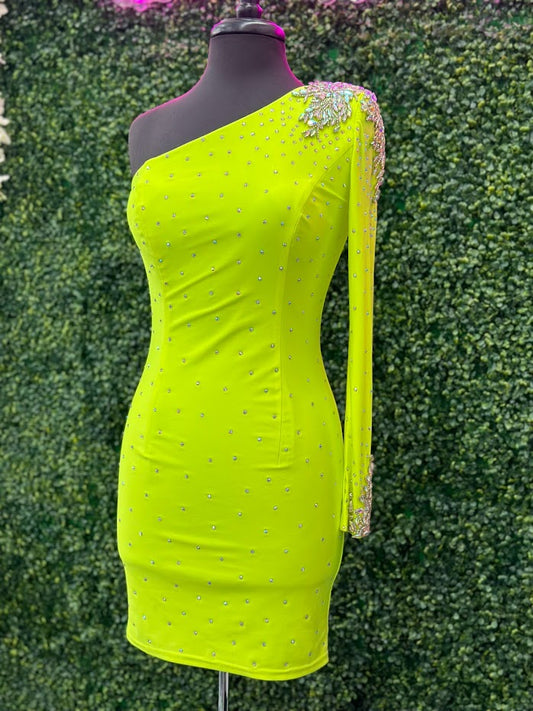 This Johnathan Kayne 2785 dress is perfect for your homecoming event. It features a single crystal shoulder, long sleeve with crystal wrist line, and stoned bodice for a sparkling look. It is also fitted for a flattering silhouette. Perfect for a memorable night.  Sizes: 4  Colors: Neon Green