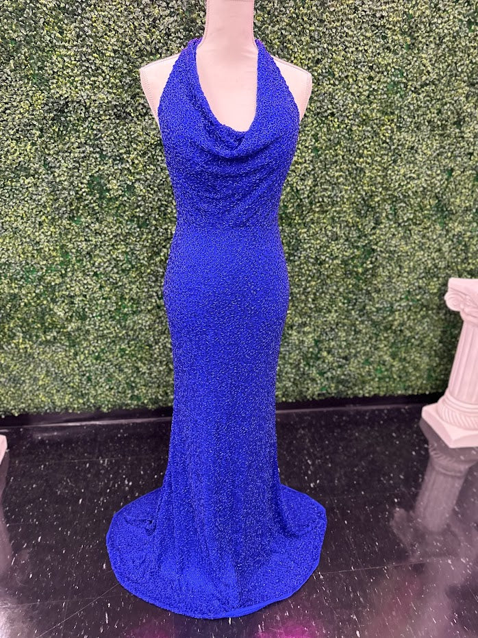 Johnathan Kayne 2728 is a size 4 cowl neck formal gown crafted with Custom Liquid Beading. The halter neck closure makes for a beautiful and stylish silhouette with a royal finish. Perfect for your next event!   ** One of a kind Custom  Size: 4  Color: Royal