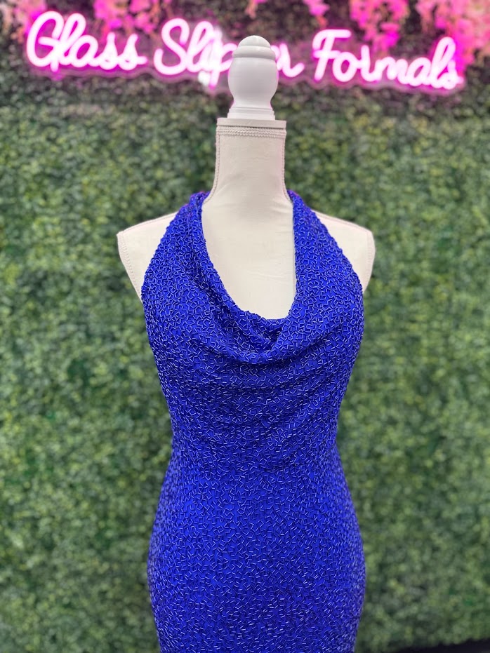 Johnathan Kayne 2728 is a size 4 cowl neck formal gown crafted with Custom Liquid Beading. The halter neck closure makes for a beautiful and stylish silhouette with a royal finish. Perfect for your next event!   ** One of a kind Custom  Size: 4  Color: Royal