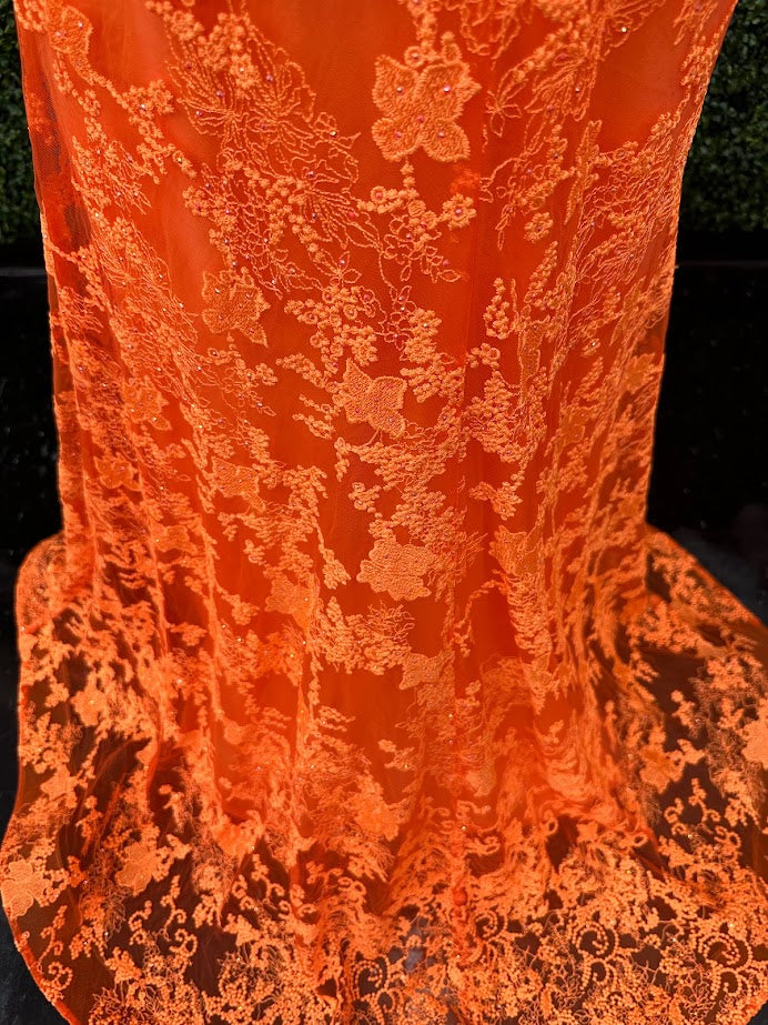 Look stunning in this Johnathan Kayne 31575 Size 4 Orange Lace V Neck Fitted Formal Prom Dress. Crafted from shimmering lace, this fitted design is sure to draw eyes. Show off your best features in this show-stopping dress.  Size: 4  Color: Orange