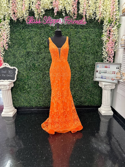 Look stunning in this Johnathan Kayne 31575 Size 4 Orange Lace V Neck Fitted Formal Prom Dress. Crafted from shimmering lace, this fitted design is sure to draw eyes. Show off your best features in this show-stopping dress.  Size: 4  Color: Orange