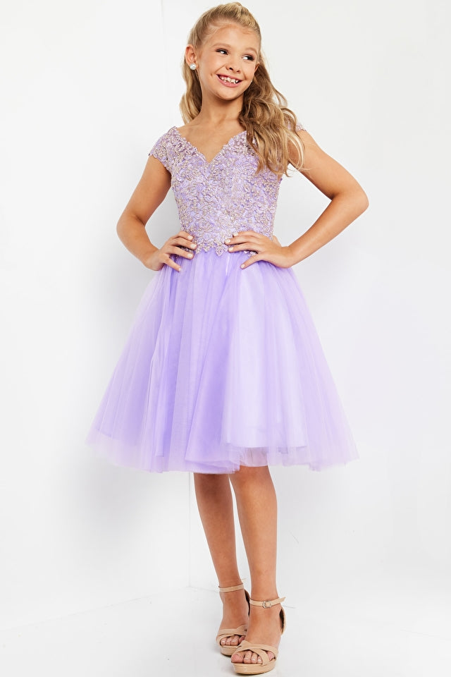 Jovani Kids K04711 Jovani K04711 V-Neck Fit and Flare Embellished Bodice Kids Short Dress. The Jovani K04711 dress is sure to make your little one shine! Not only is this dainty delight fit and flare style with an embellished bodice, but its V-neckline adds an extra touch of elegance to the proceedings. Your star can strut her stuff with confidence knowing she looks fabulous from every angle!