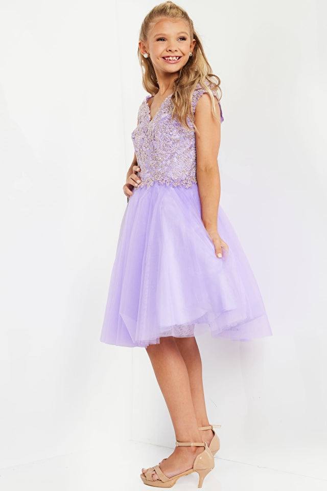 Jovani Kids K04711 Jovani K04711 V-Neck Fit and Flare Embellished Bodice Kids Short Dress. The Jovani K04711 dress is sure to make your little one shine! Not only is this dainty delight fit and flare style with an embellished bodice, but its V-neckline adds an extra touch of elegance to the proceedings. Your star can strut her stuff with confidence knowing she looks fabulous from every angle!