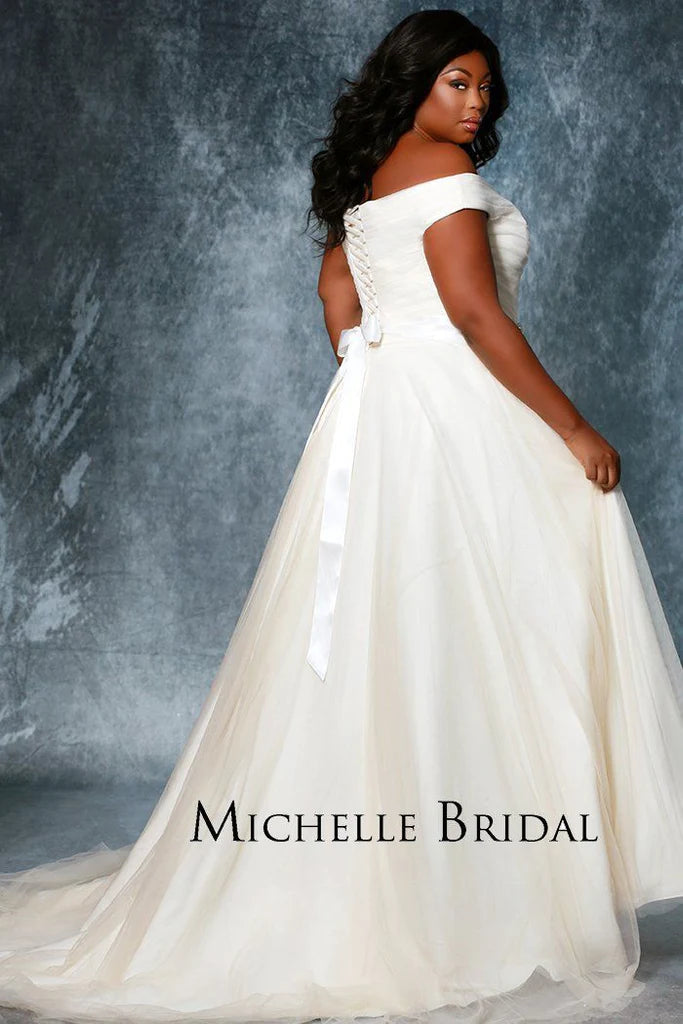 Michelle Bride For Sydney's Closet MB1812 A-Line V-Neck Lace Up Back Off The Shoulder Straps Pleated Plus Size Bridal Gown. Look radiant in the Michelle Bride For Sydney's Closet MB1812 A-Line V-Neck Gown. Crafted from quality fabric, this design features off the shoulder straps, a pleated bodice, and a lace-up back for an adjustable fit. Perfect for the plus-size bride!