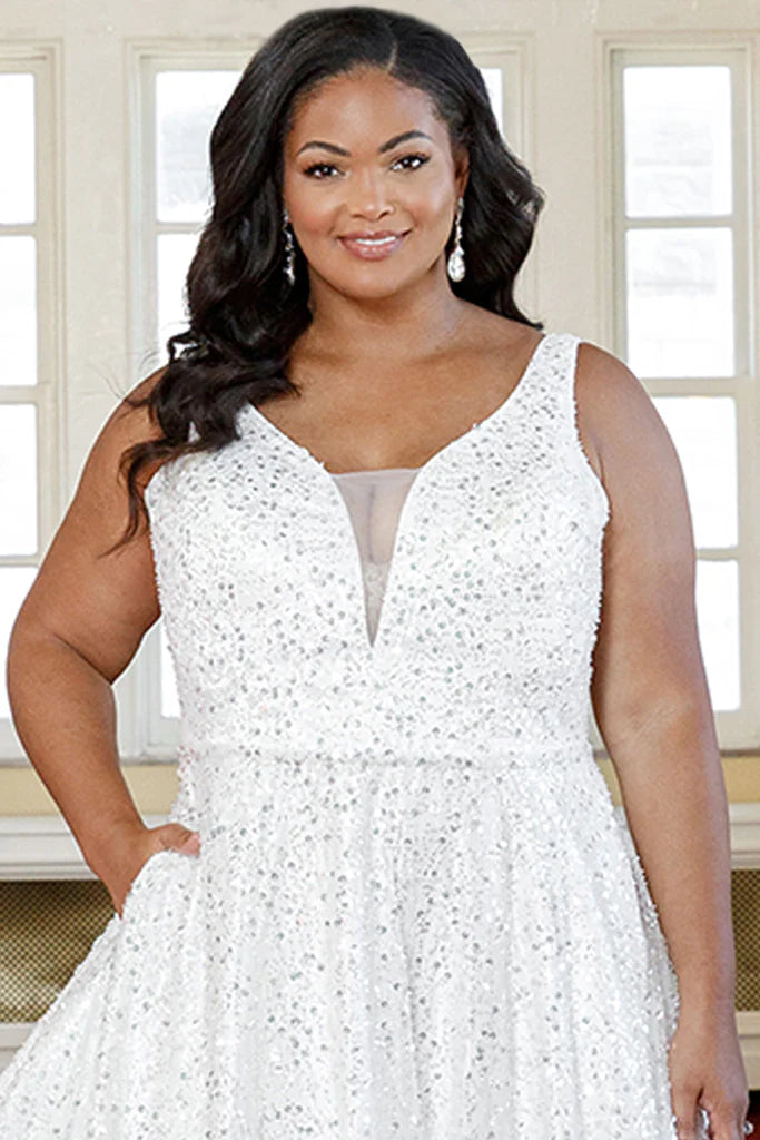 Michelle Bridal For Sydney's Closet MB2311 A-Line Ivory Mesh Silver Paillettes Clear Sequins Bugle Beads Bridal Satin Detachable Belt V-Neck Plus Size "Coco" Bridal Gown.  Be the belle of the ball in this sophisticated Michelle Bridal for Sydney's Closet wedding gown. Crafted from ivory mesh with silver paillettes, clear sequins, and bugle beads, the detachable bridal satin belt cinches the A-line silhouette and V-neckline for a resplendent look. Perfect for plus size brides, 