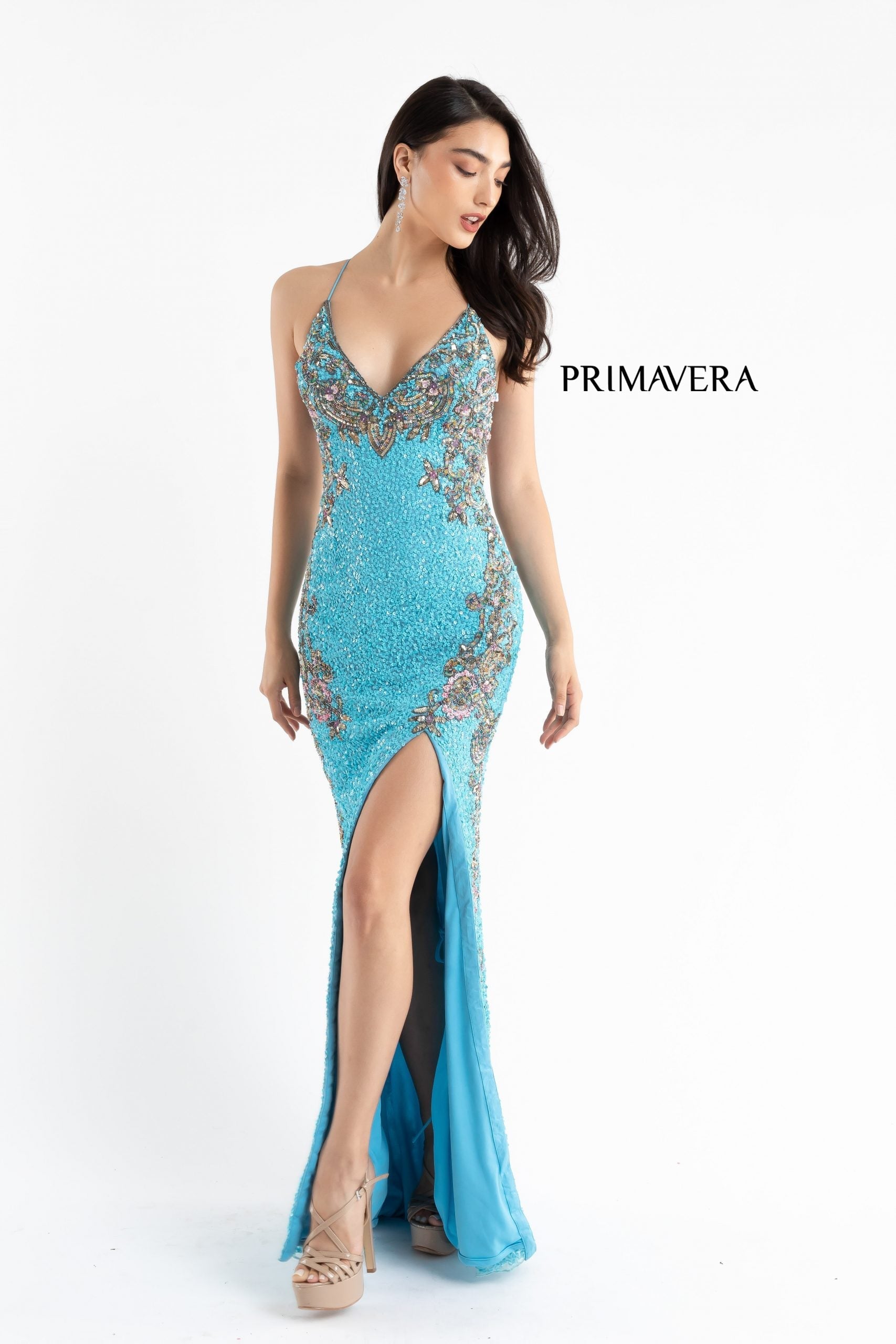 Primavera Couture 3211 is a Long fitted sequin Embellished Formal Evening Gown. This Prom Dress Features a deep V Neck with an open Corset lace up back. Beaded & embellished elegant scroll pattern accentuate curves. Fully beaded prom dress with floral pattern and side slit. Long Sequin Gown featuring a v neckline. slit in the fitted skirt, Slit in Thigh. Stunning Pageant Dress, Prom Gown & More!