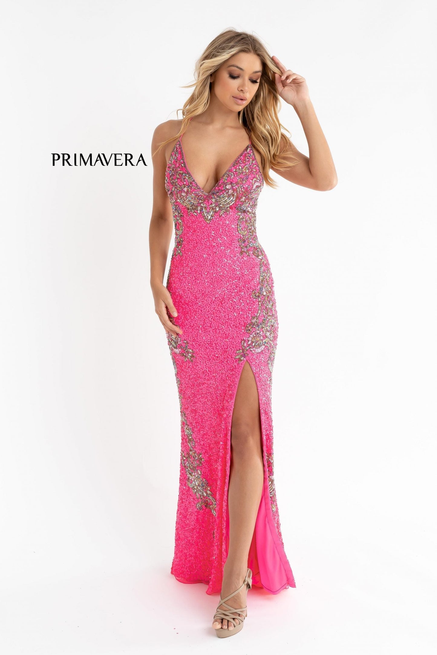 Primavera Couture 3211 is a Long fitted sequin Embellished Formal Evening Gown. This Prom Dress Features a deep V Neck with an open Corset lace up back. Beaded & embellished elegant scroll pattern accentuate curves. Fully beaded prom dress with floral pattern and side slit. Long Sequin Gown featuring a v neckline. slit in the fitted skirt, Slit in Thigh. Stunning Pageant Dress, Prom Gown & More!