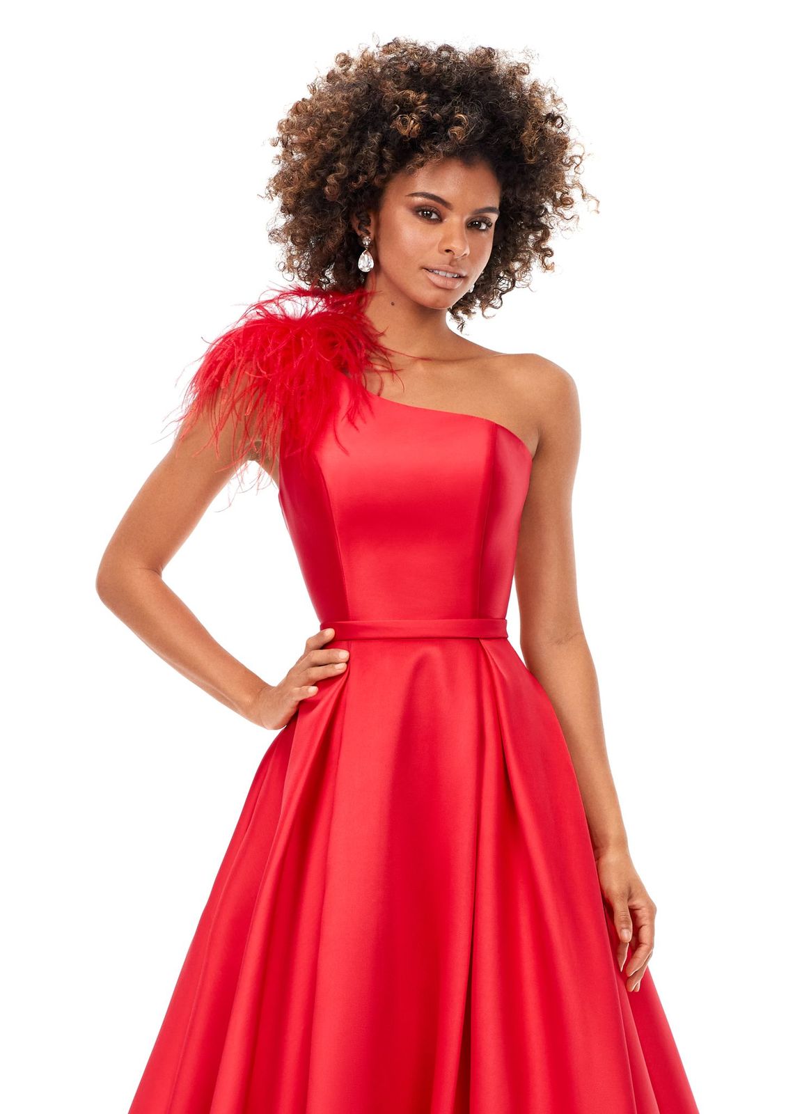 Ashley Lauren 11336 This elegant and sophiscated one shoulder ball gown is sure to make a statement at your next event. The neckline is emebellished with feather details. The a-line skirt completes the look. One Shoulder A-Line Skirt Feather Details Mikado COLORS: Turquoise, Ivory, Red