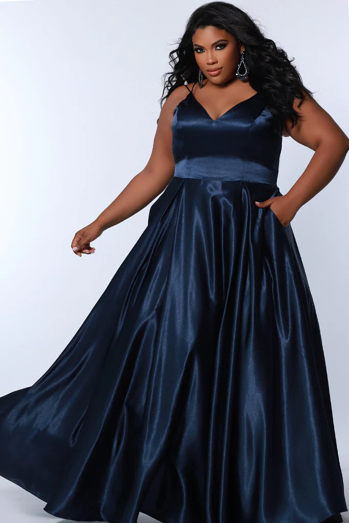 Sydney's Closet SC7363 Satin A-Line Silhouette With Pockets Sweetheart Neckline Spaghetti Strap Plus Size Prom Dress. For all your prom dreams, the Sydney's Closet SC7363 is where it's at! This show-stopping satin dress features a sweetheart neckline, spaghetti straps, and A-line silhouette with handy pockets. Plus-size perfection for any special event! Dare to dazzle!