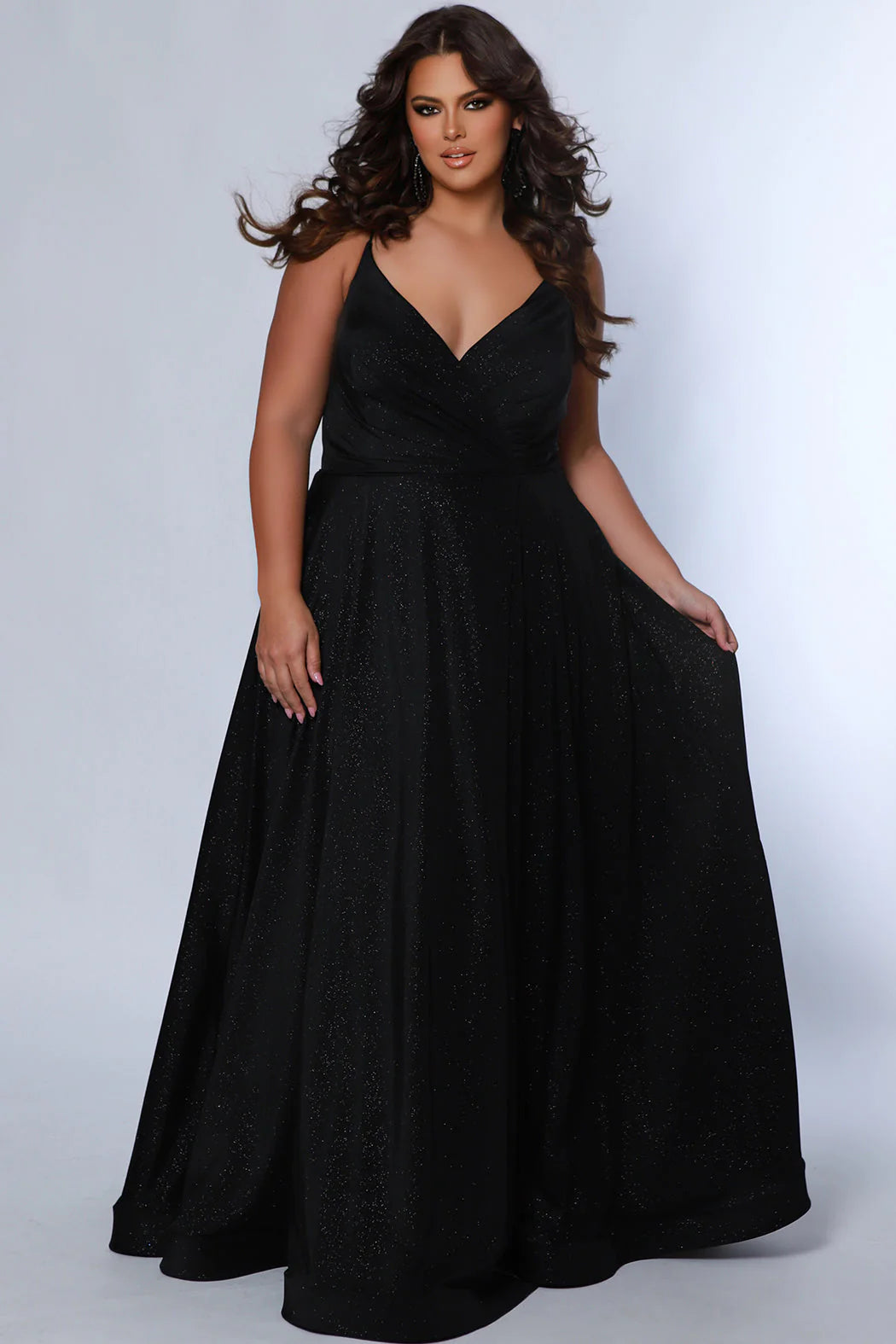 Look your best in our Sydney's Closet SC7375 Long Prom Dress - a beautiful A-line plus-size with a shimmering look an alluring maxi slit, and a formal gown silhouette that is perfect for any special event. The dress offers a flattering fit for all body types. All eyes are on you when you sparkle in this fabulous formal gown designed for women with real curves.