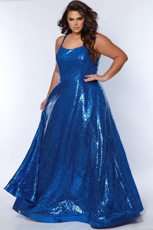 Make a statement in the Sydneys Closet SC7387 Plus Size Sequin A-Line Prom Dress. This beautiful formal gown features beaded sequin detailing, a flattering scoop neckline, and an elegant A-line silhouette. Perfect for prom, pageants, and other special occasions. Sparkle all night long when you wear this long evening gown to Prom or any other formal event on your social calendar that calls for the glamour of overall sequins.