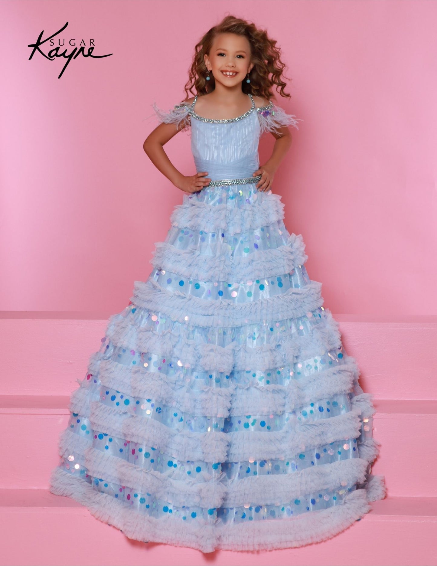 Sugar Kayne C342 is a long layered ruffled A-line ballgown designed specifically for preteen girls who want to make a statement. This one of a kind dress features off-shoulder details and feathers for an added touch of elegance. Perfect for any pageant or special occasion. Dress like the true princess you are! This enchanting mesh ballgown featuring ruffles on the skirt is designed to make you shine bright on the stage!