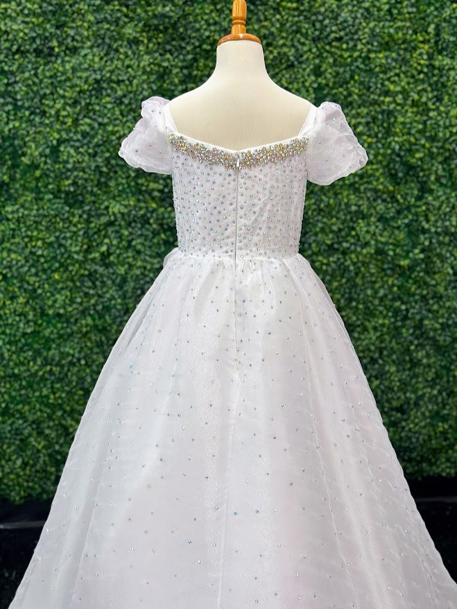 Elevate your little girl's formal look with the Samantha Blake 1021 Girls Shimmer Pageant Dress. The elegant cap sleeves, crystal detailing, and A-line silhouette make for a truly stunning gown. Perfect for any special occasion, this dress will make your daughter shine like a star. Shimmer Organza with hot fix rhinestone &amp; Amazing Crystal Bursts!