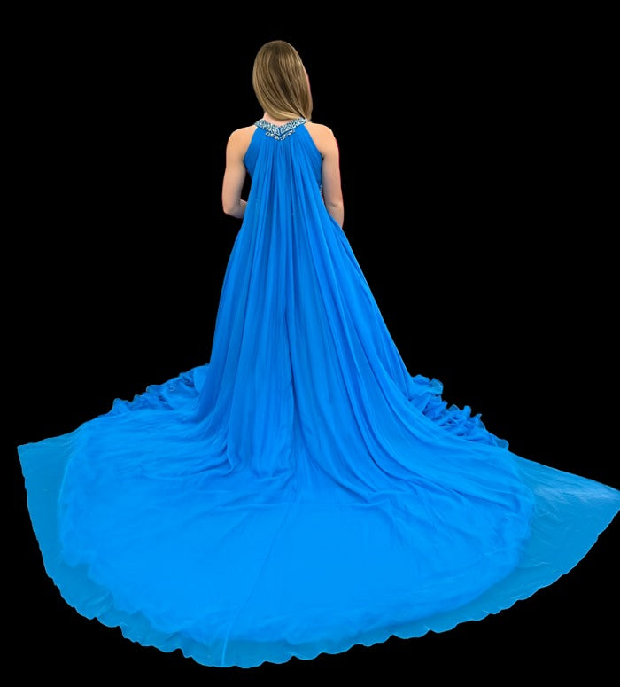 Samantha Blake 1102 Girls Pageant Dress. This stunning A Line Chiffon gown, complete with a detachable crystal Embellished cape and chiffon material, will make any young girl feel like a princess. With its train design, it offers elegance and grace for any special occasion. Get yours today and make a statement at your next Pageant.