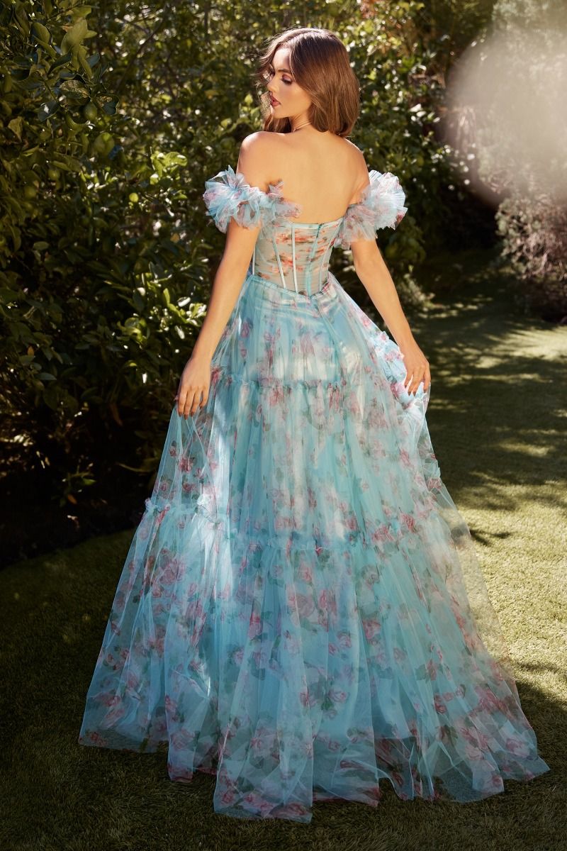 This stunning prom dress by Andrea & Leo Couture features a beautiful floral print, a sheer corset bodice for a touch of sensuality, and a flattering A-line silhouette. The puff sleeves and V-neckline add a touch of romance to this elegant design. Perfect for any special occasion, this dress is sure to make you feel confident and beautiful. Step into a dream with this off-the-shoulder floral printed tulle A-line dress—a whimsical ode to the enchanting world of cottage core