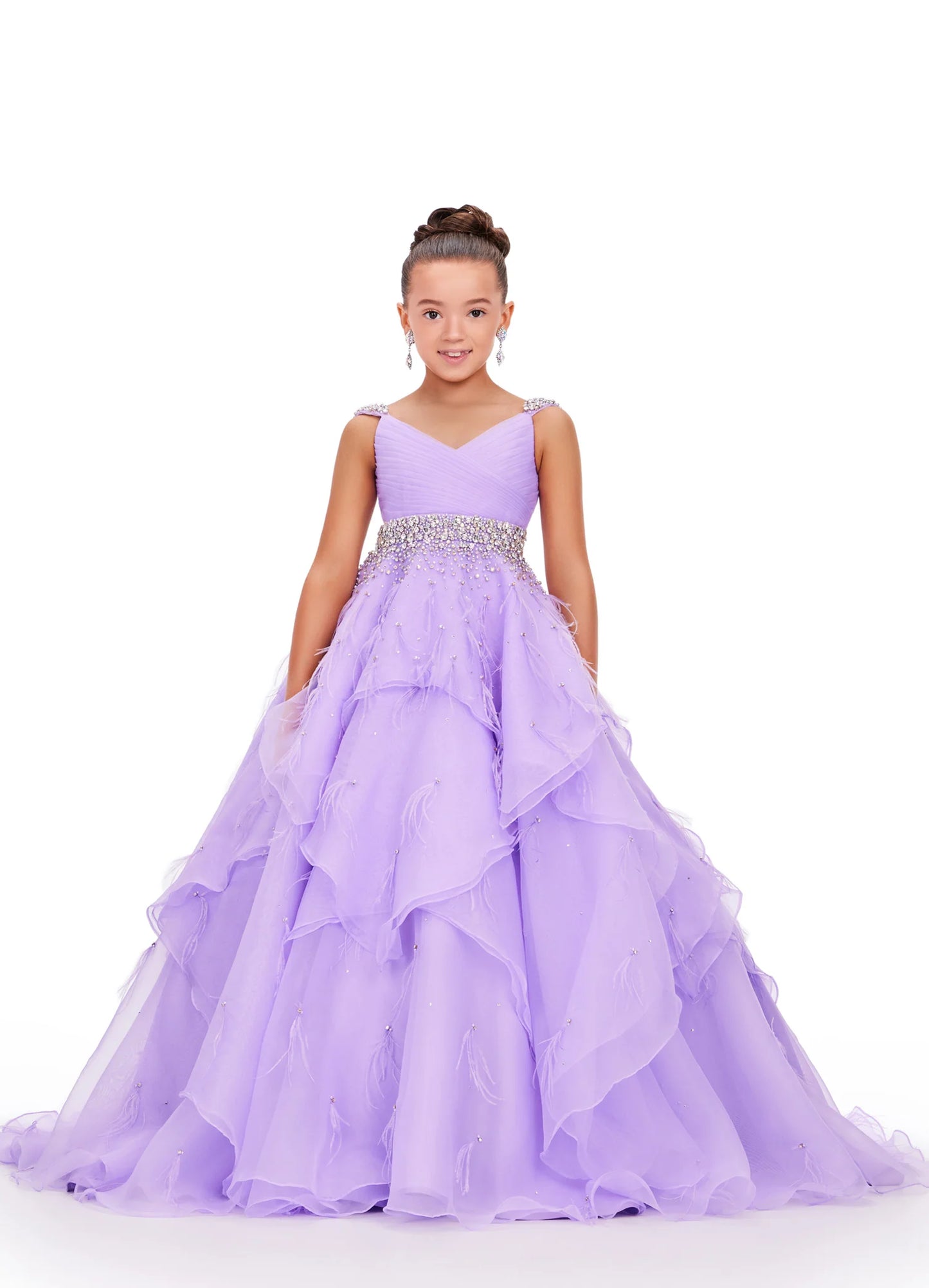 Elevate your little one's pageant look with the Ashley Lauren Kids 8219 Girls Layered Feather Pageant Dress. This stunning ballgown features a V-neck embellished with feathers, adding a touch of glamour to the overall design. With its layered skirt, this dress will make your child feel like a princess on stage. Be the star of the show in this fabulous organza ball gown