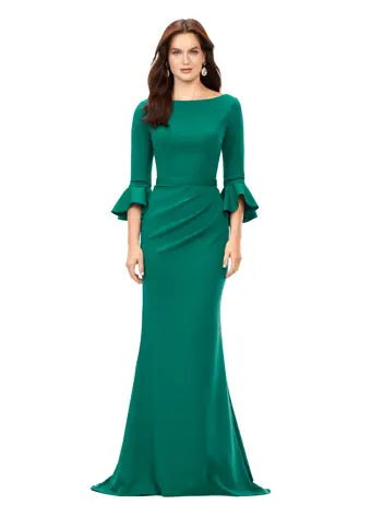 Ashley Lauren 11325 Crew Neck Three Quarter Flutter Sleeves Ruched Skirt Fitted Gown. This timeless and elegent evening gown features flutter three quarter sleeves. The skirt is adorned with ruching and finished with a sweep train.